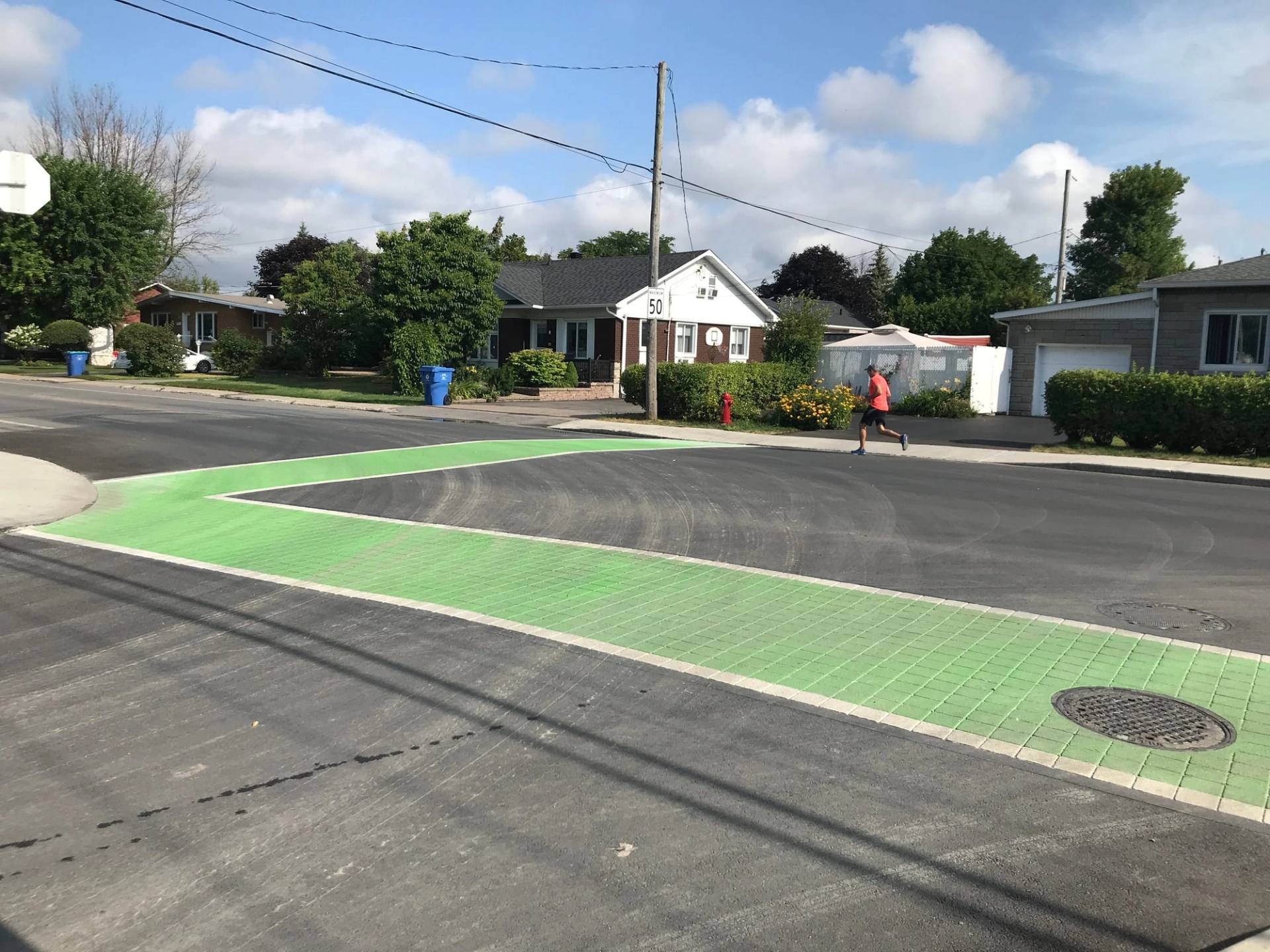 Decorative crosswalk in preformed thermoplastic pavement marking at a commercial district, Canada