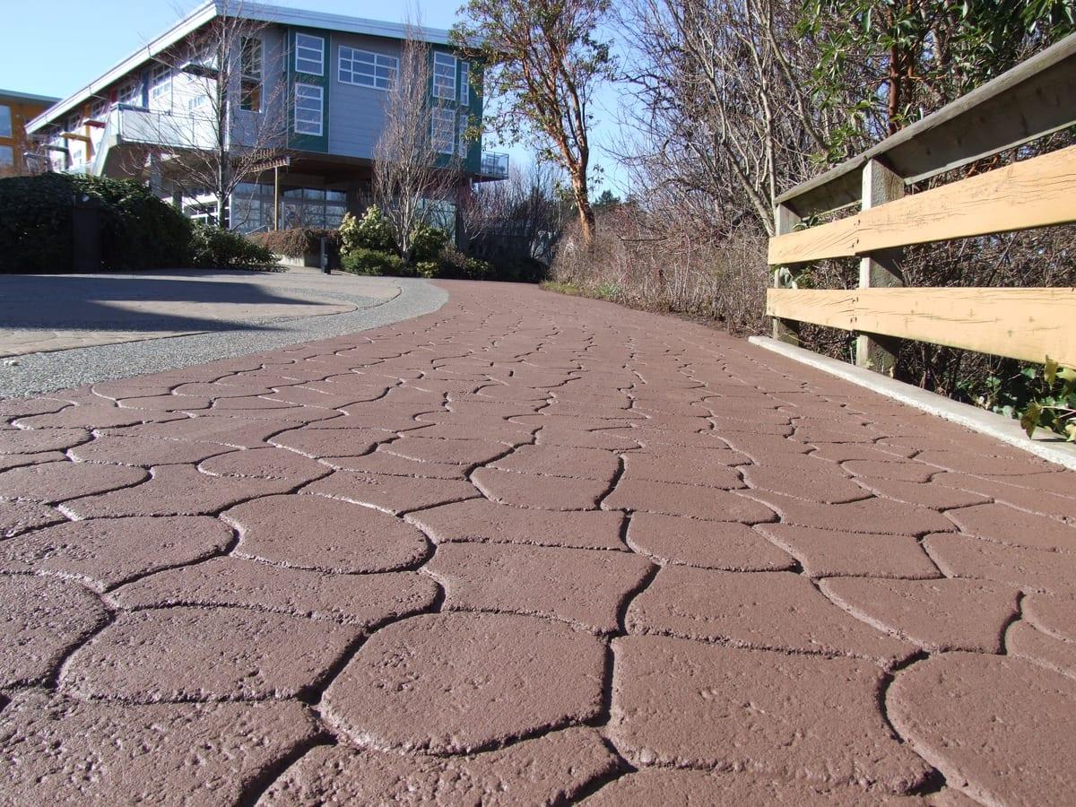 Why Stamped Asphalt Driveways Outperform Interlocking Stone (And Look Better Too)