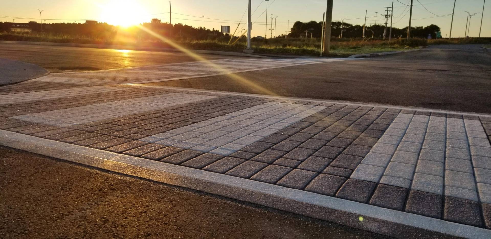 TrafficPatternsXD preformed thermoplastic in 150 mil aggregate-reinforced preformed thermoplastic at a transit station zone, Canada