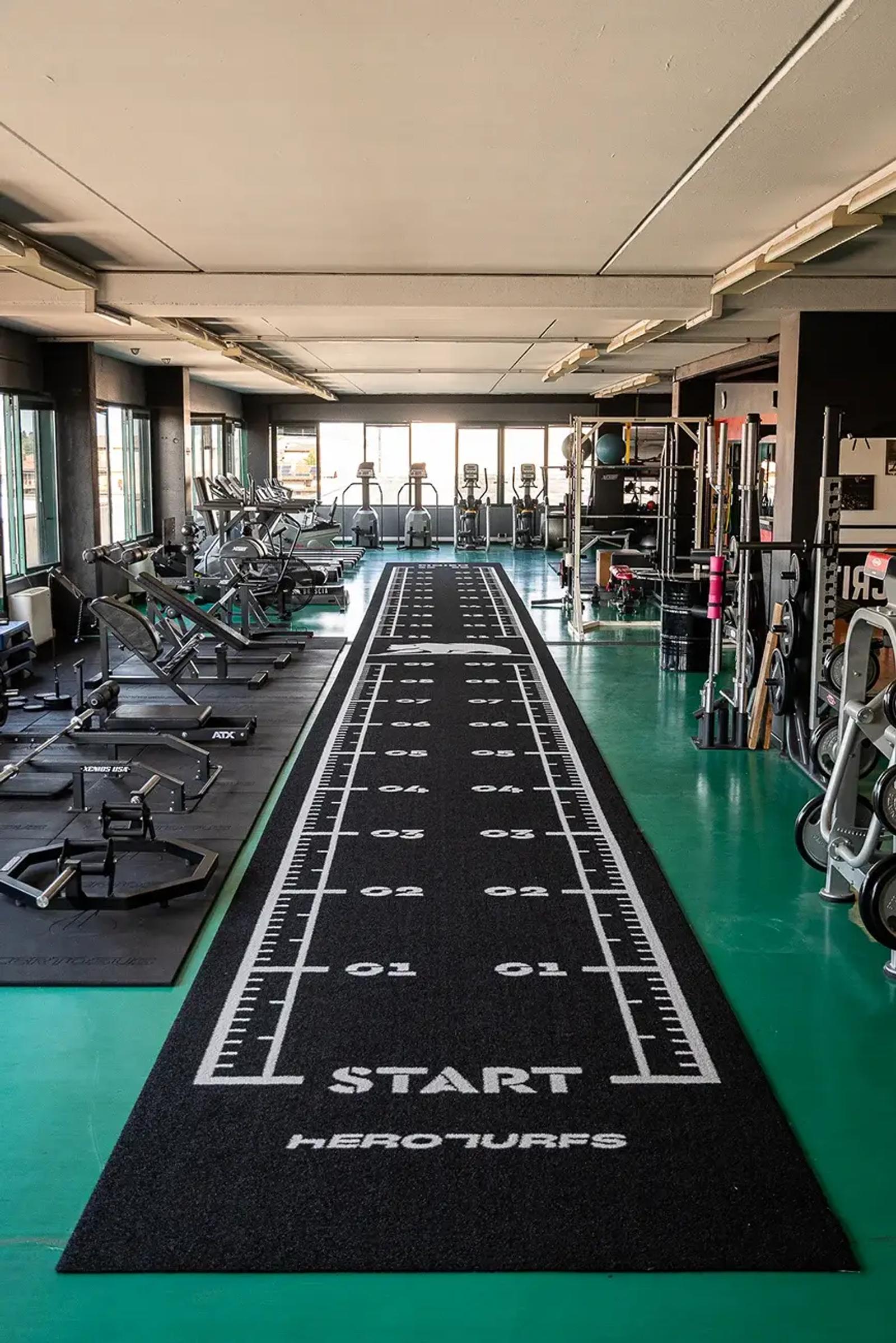 The 22 m Valhalla track with metre markings stretching across the Move Brescia training floor