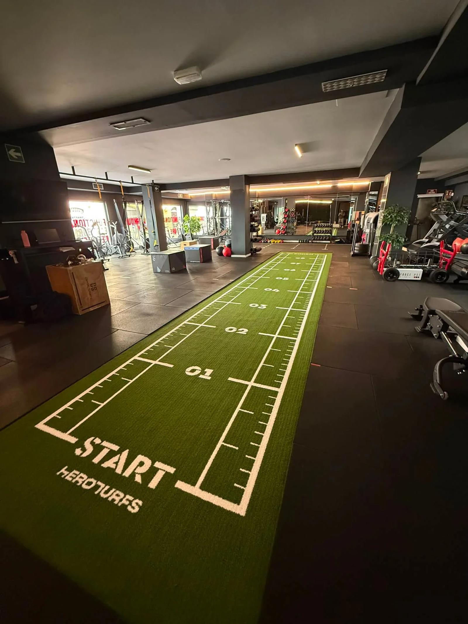 The 2 x 10 m Elysium track seen end to end between the gym equipment