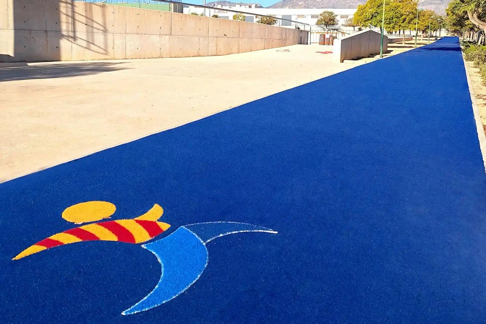 The Crevillent running track curving beside the Félix Candela pavilion