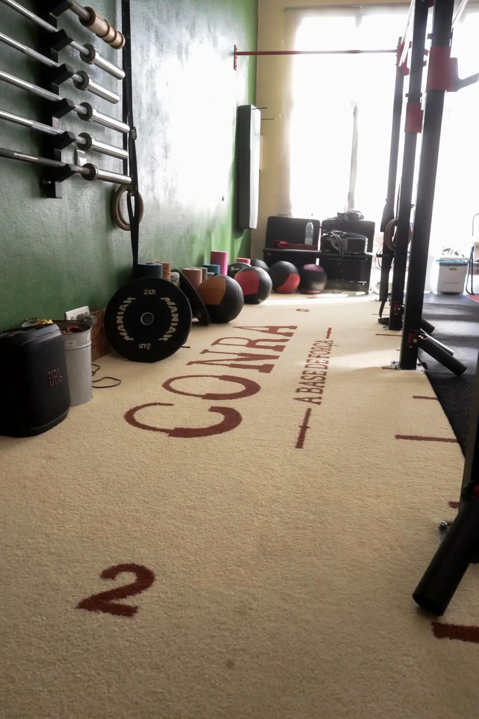 Close-up of the Aphrodite Beige and Vulcan Terracota turf texture at CONRA gym in Campos, Mallorca.