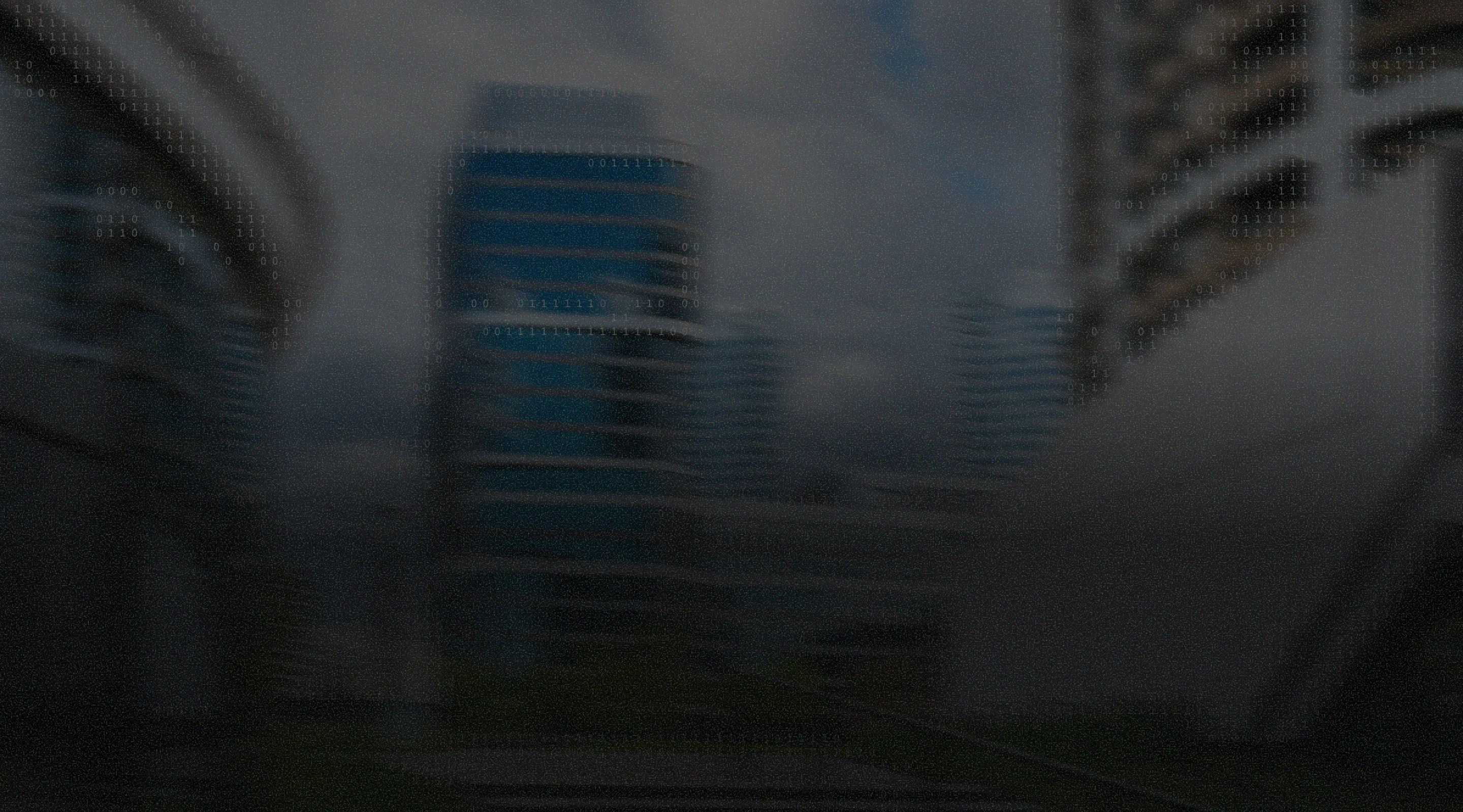 Dark, motion-blurred skyline of modern office towers