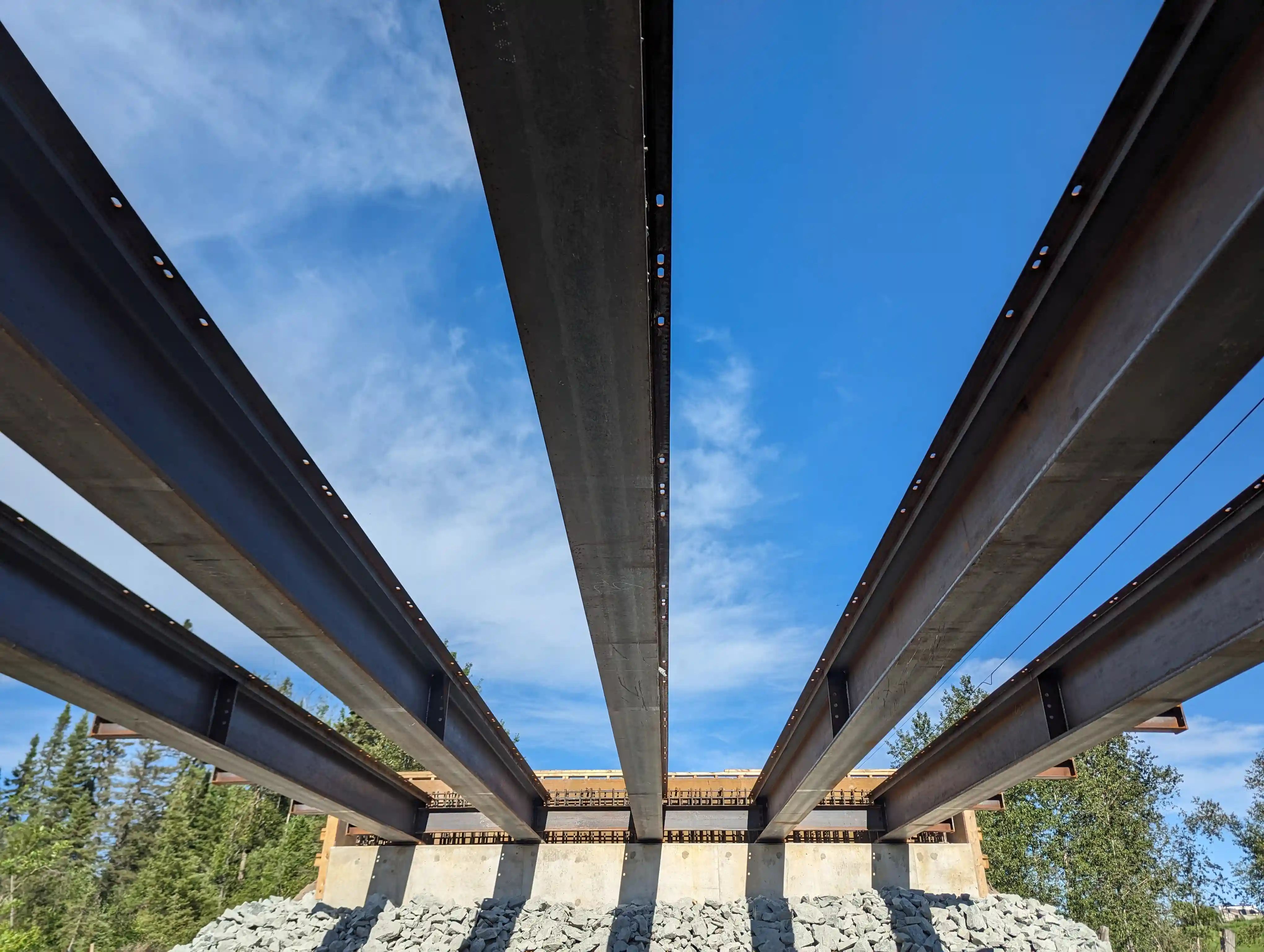 View beneath new bridge beams at the Nahma Road bridge replacement project.