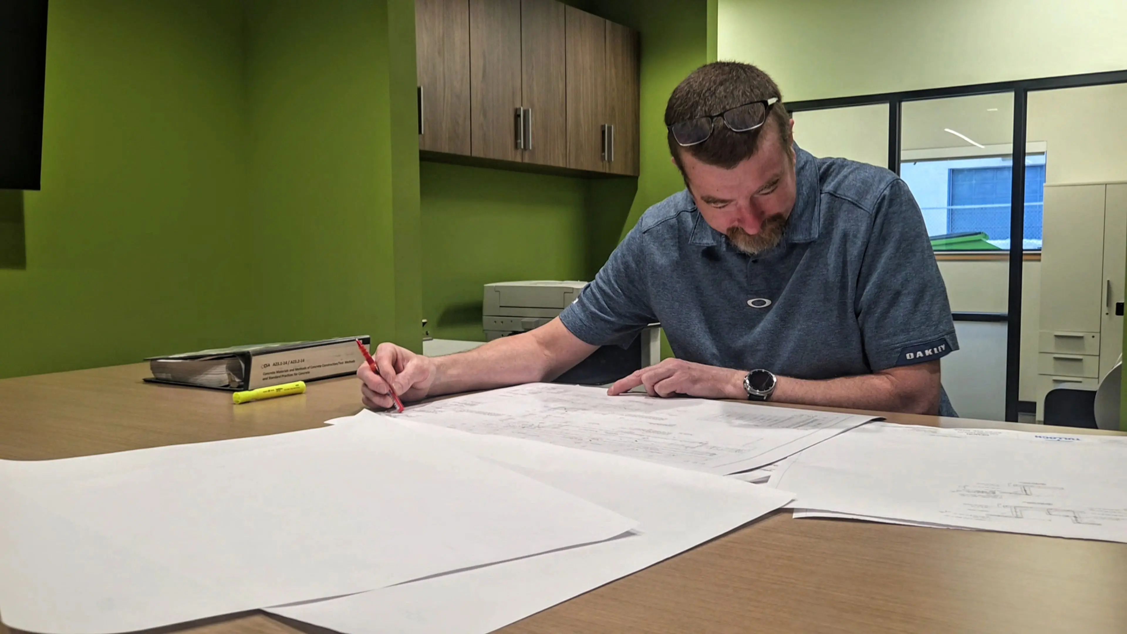 Sault Ste. Marie structural engineer reviewing drawings.