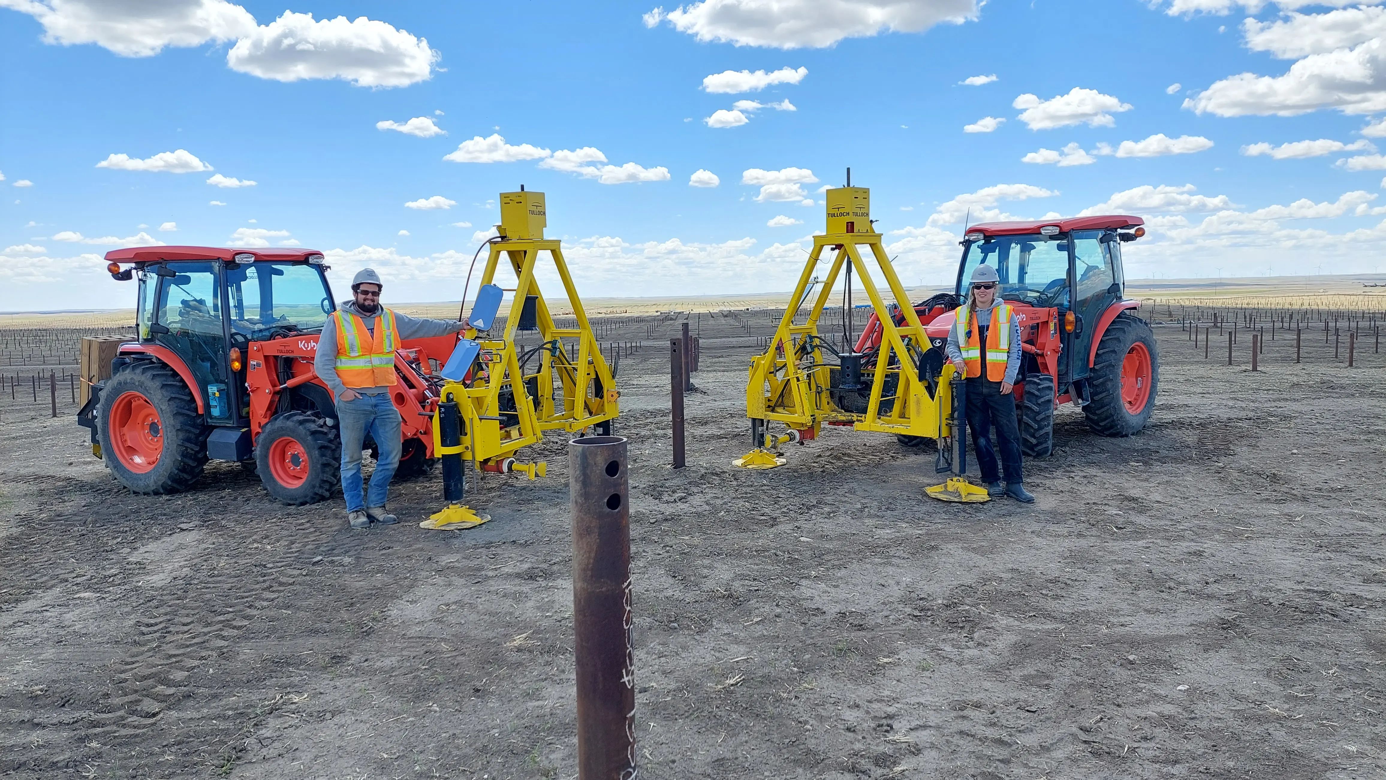 TULLOCH solar pile testing equipment set up at a renewable energy site.