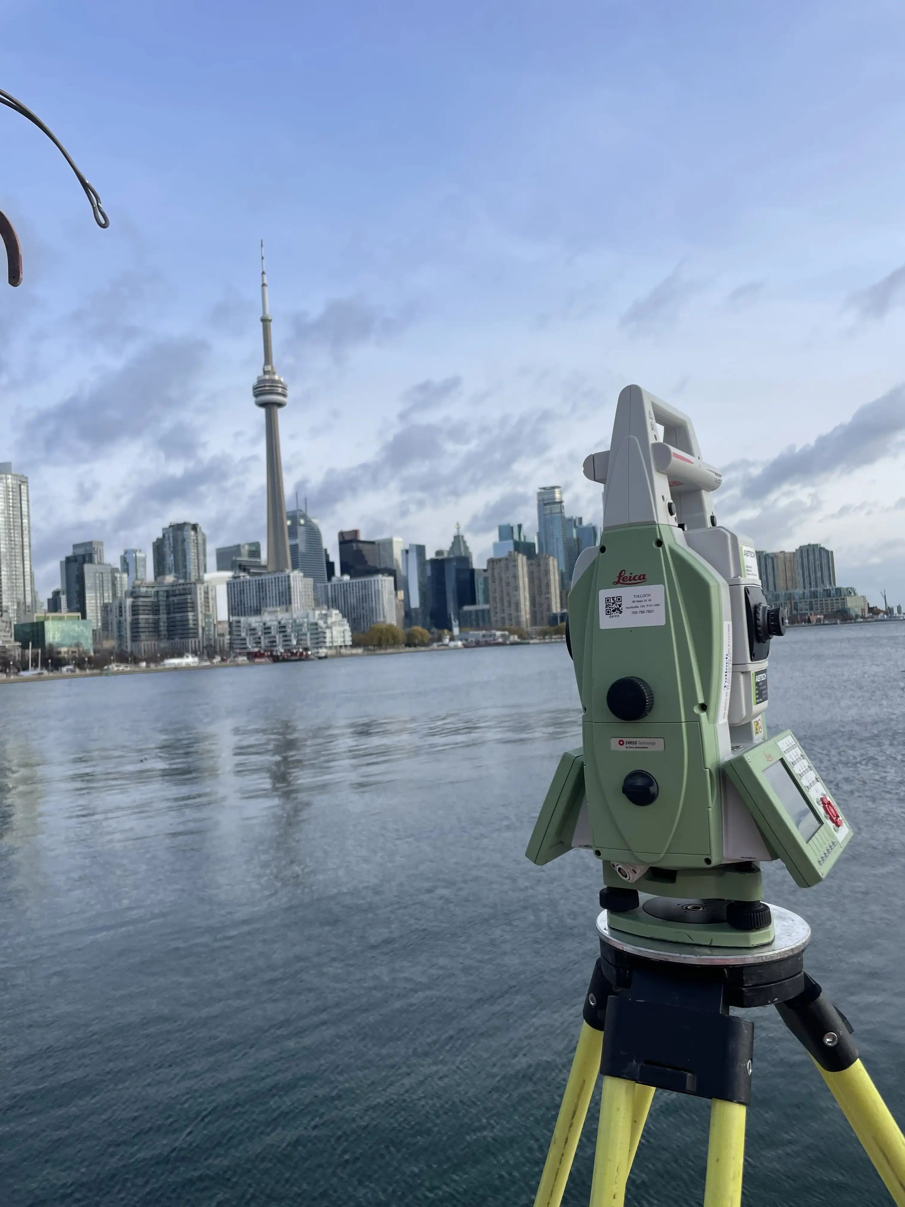 Survey instrument set up near Billy Bishop Toronto City Airport.