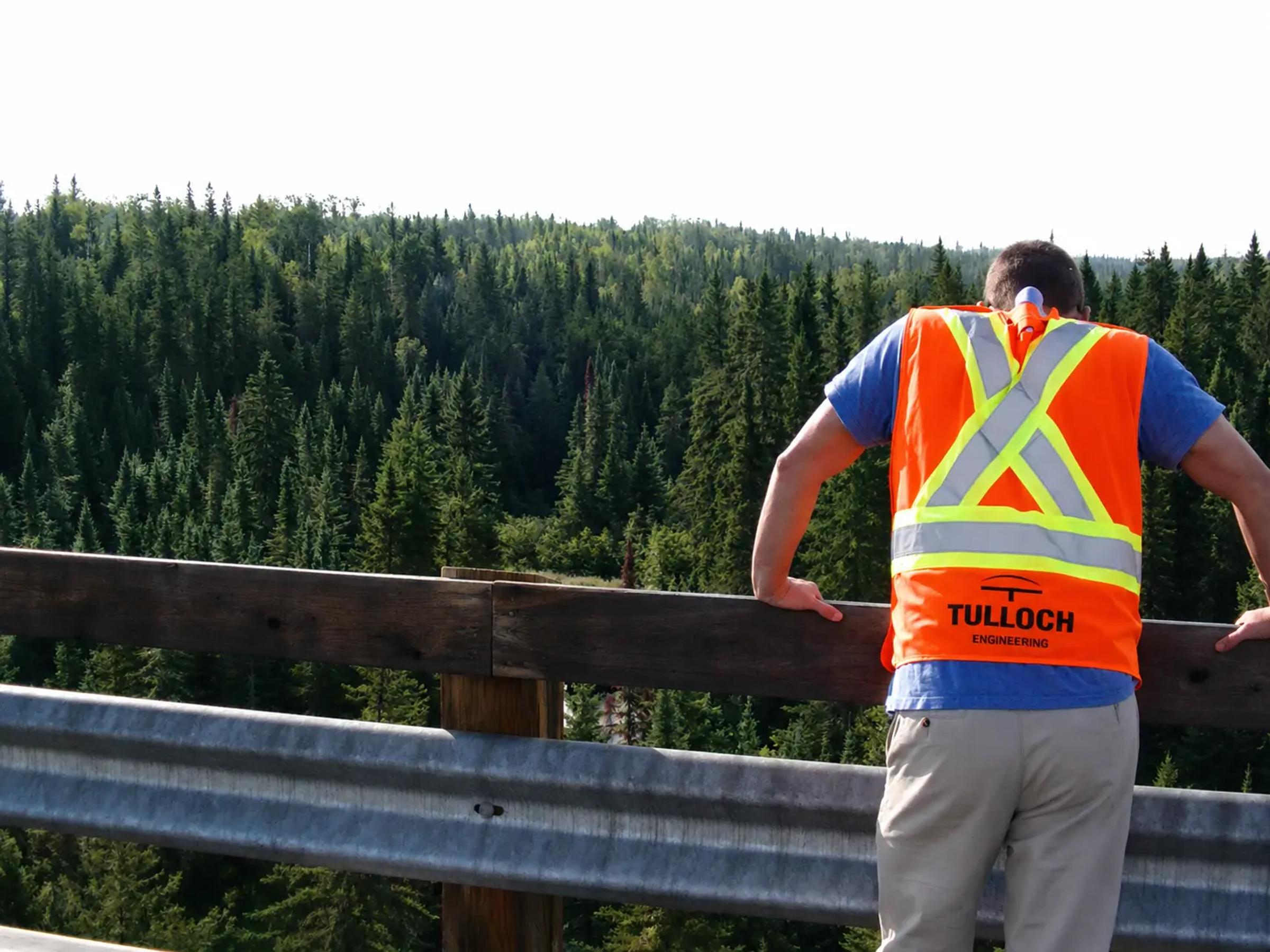TULLOCH inspector reviewing a bridge during an OSIM inspection.