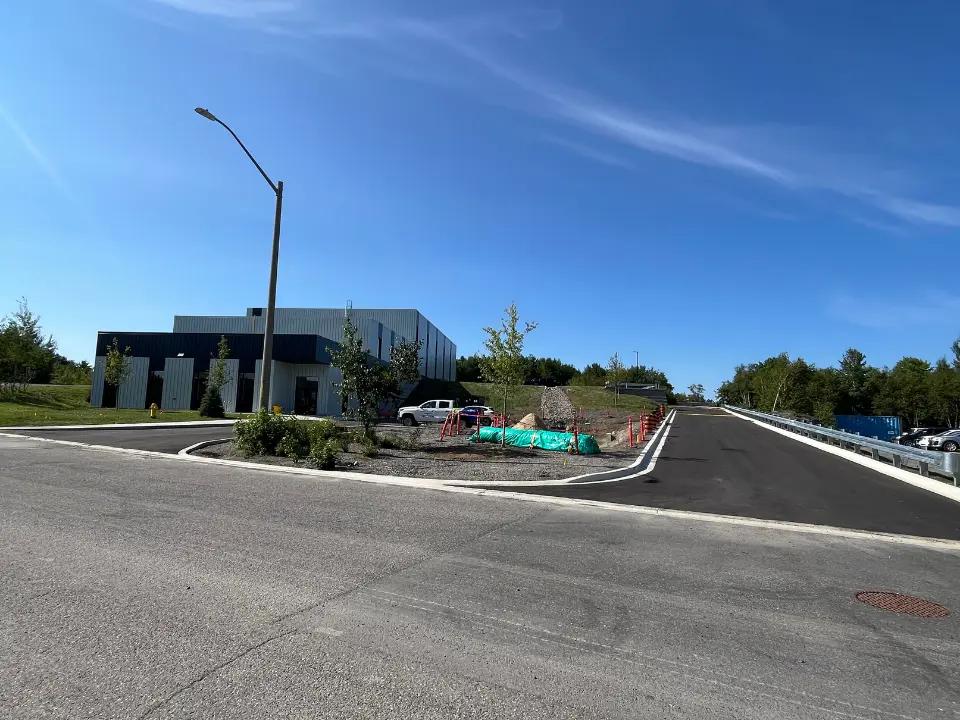Completed roadway and site access leading to the Boilermakers Union Hall property.
