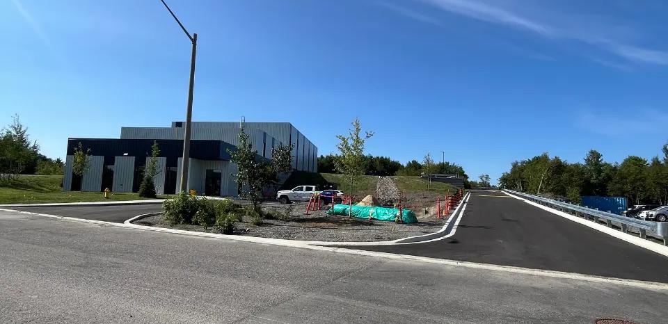 Completed roadway and site access leading to the Boilermakers Union Hall property.