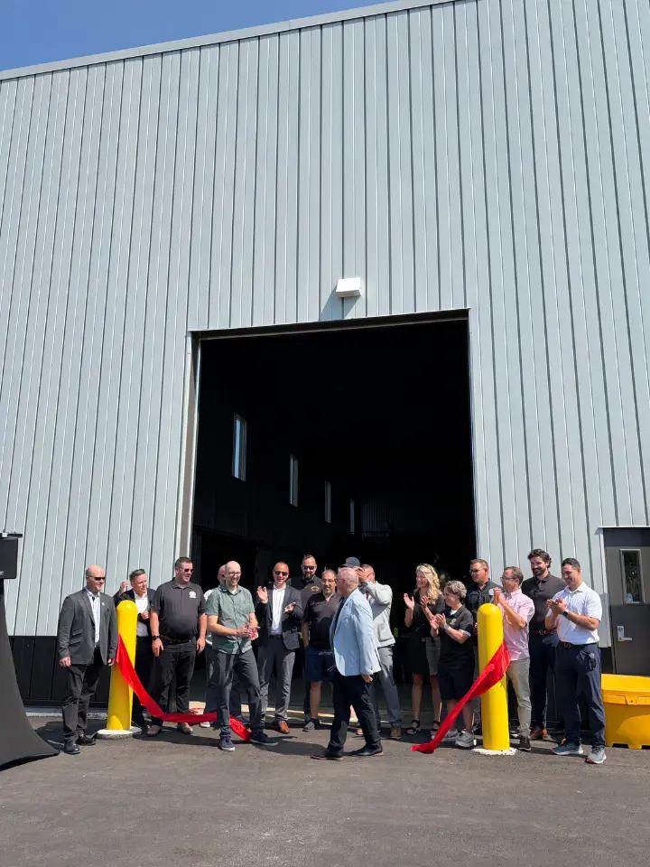 Group gathered for a ribbon-cutting ceremony outside the Boilermakers Union Hall.