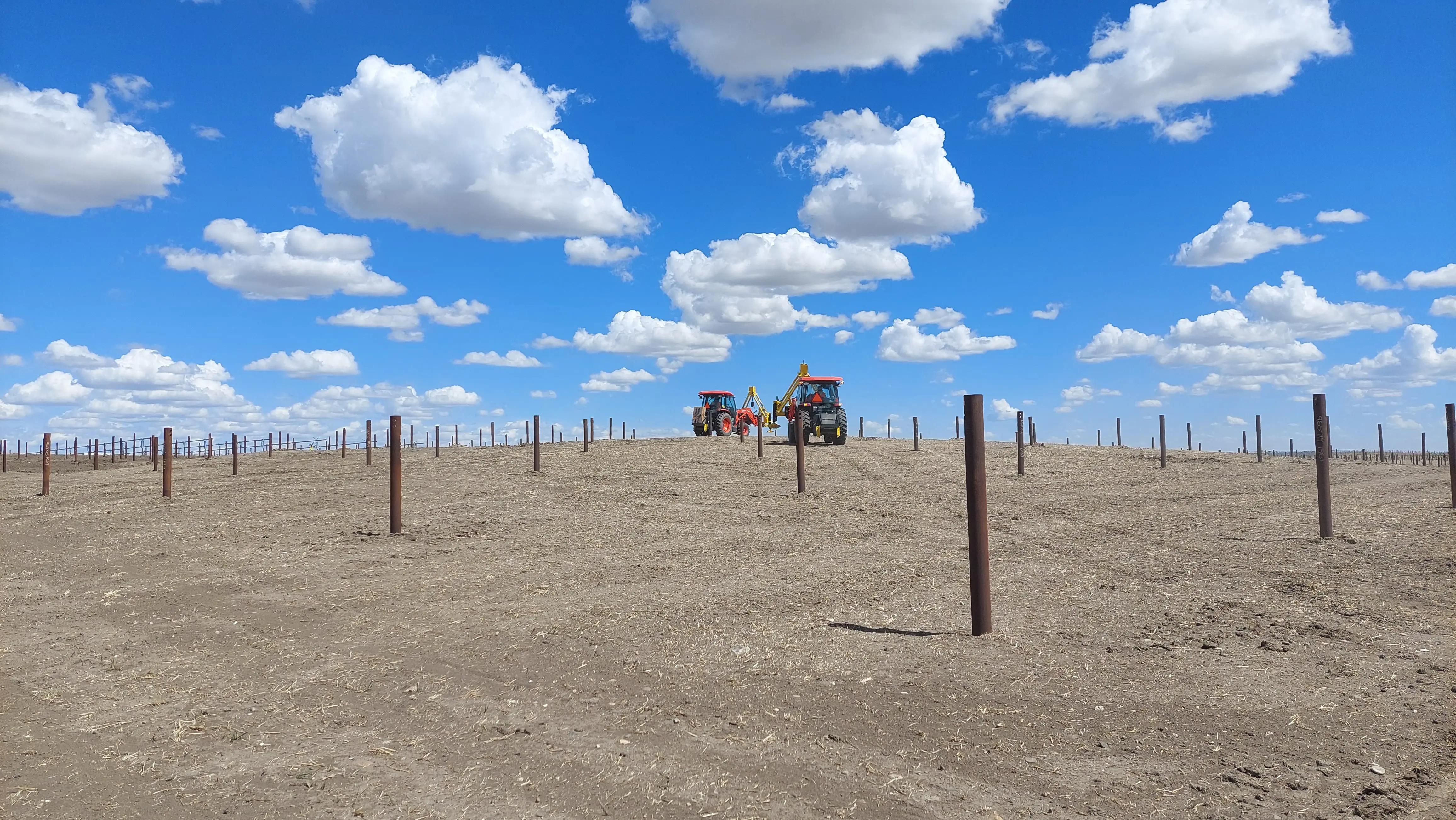 Foundation installation underway at a utility-scale solar project.