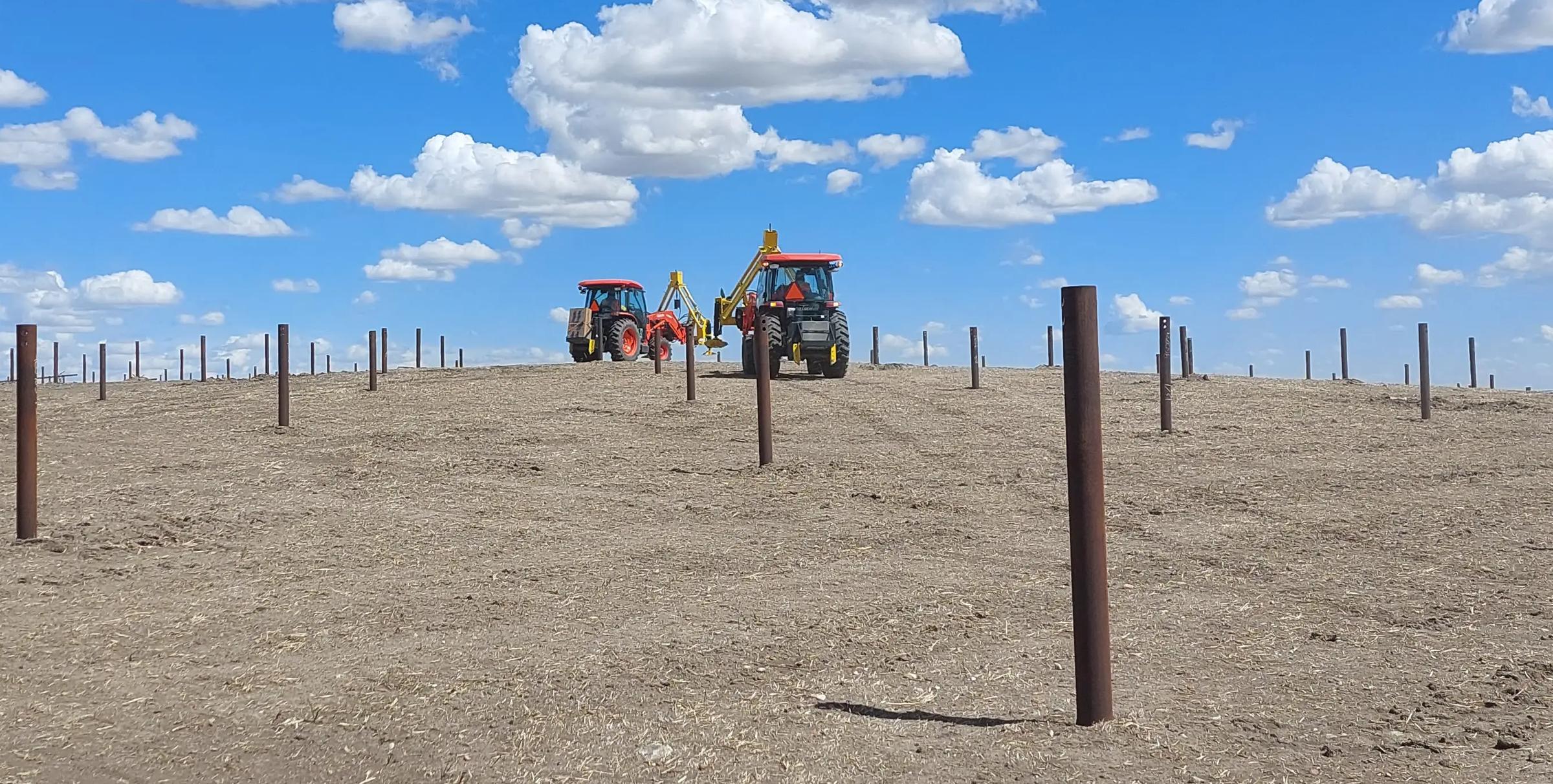 Foundation installation underway at a utility-scale solar project.