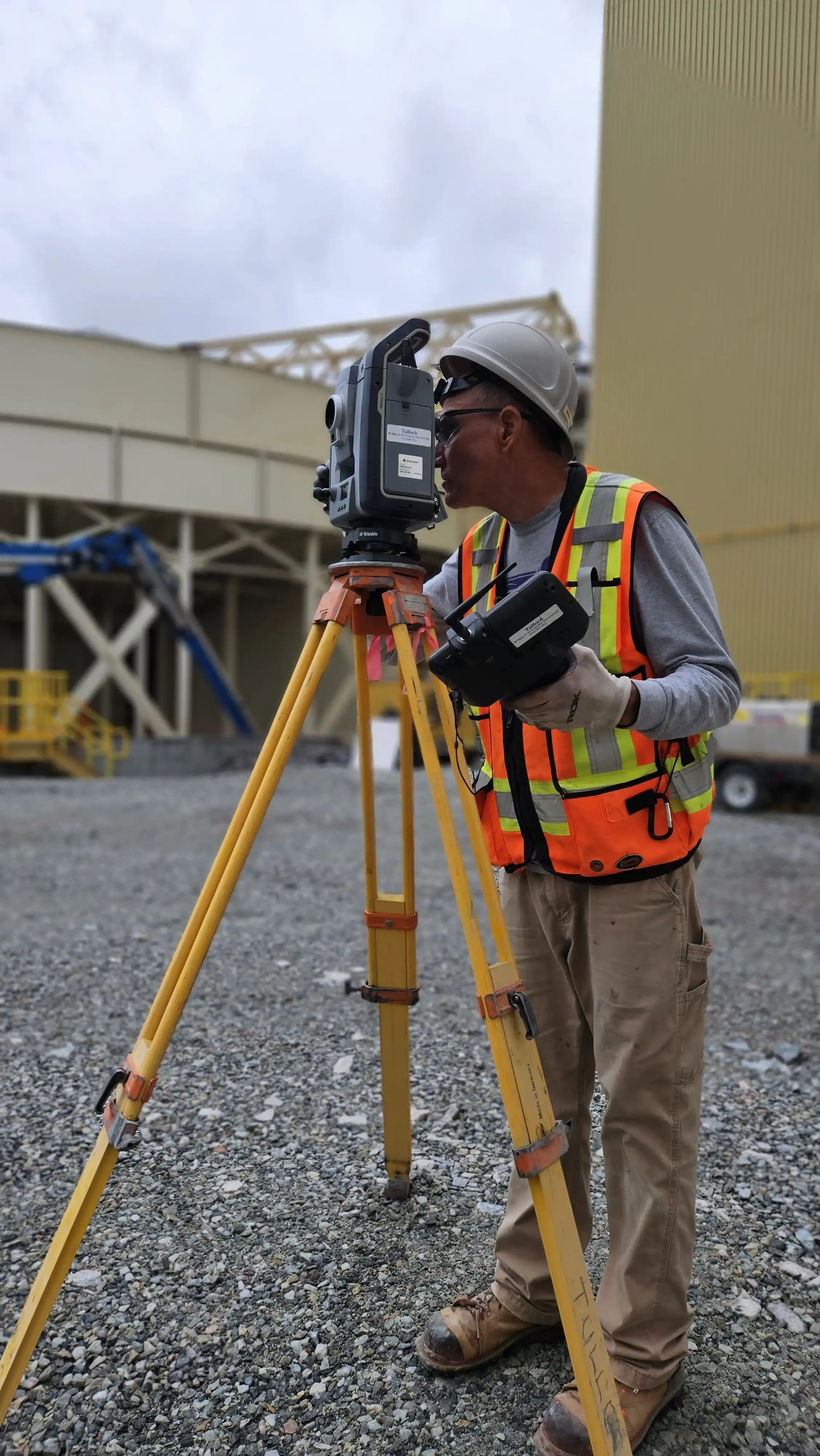 TULLOCH surveyor using a total station at the Cote Gold mine.