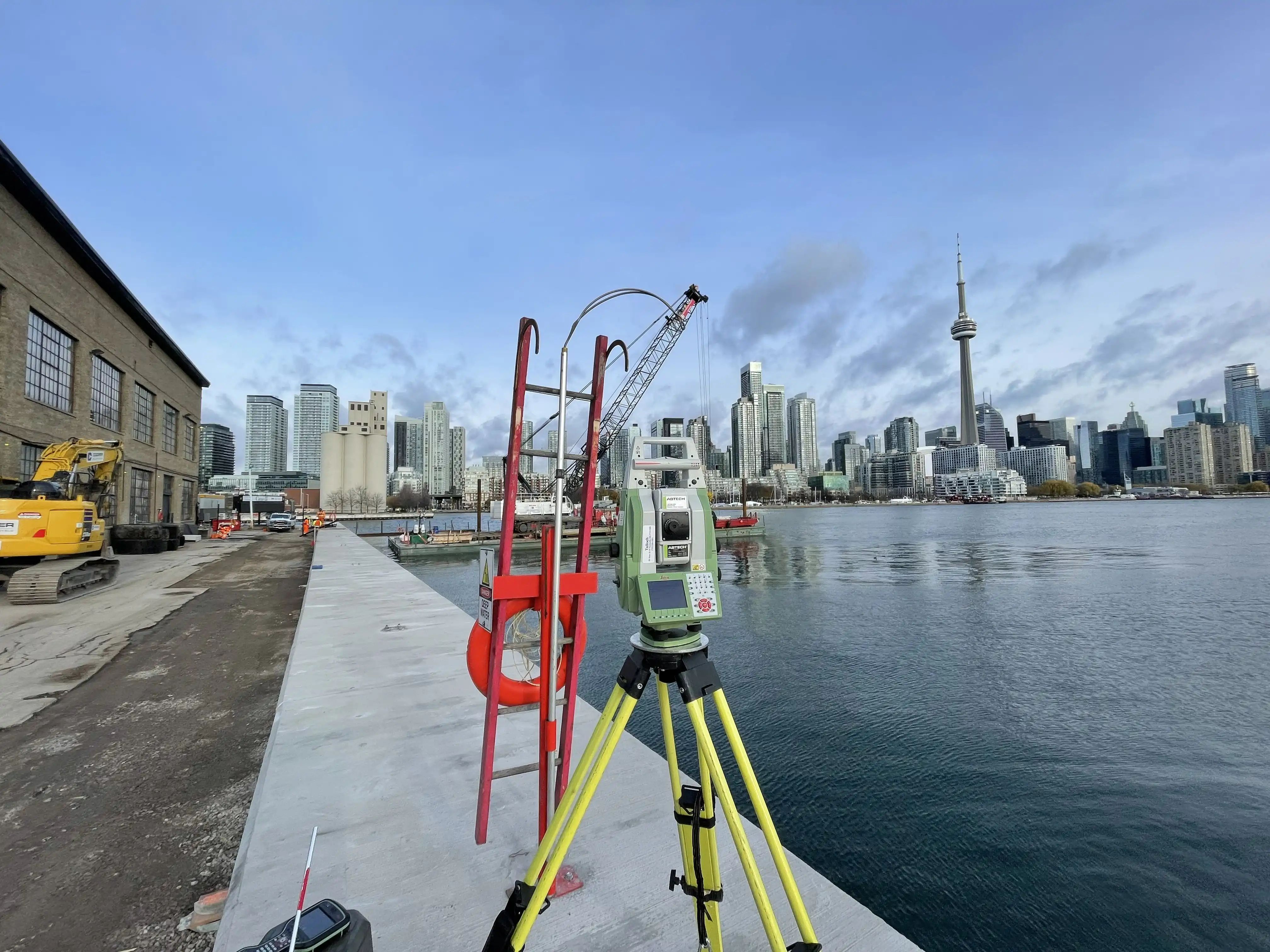 Survey equipment positioned near Billy Bishop Toronto City Airport.