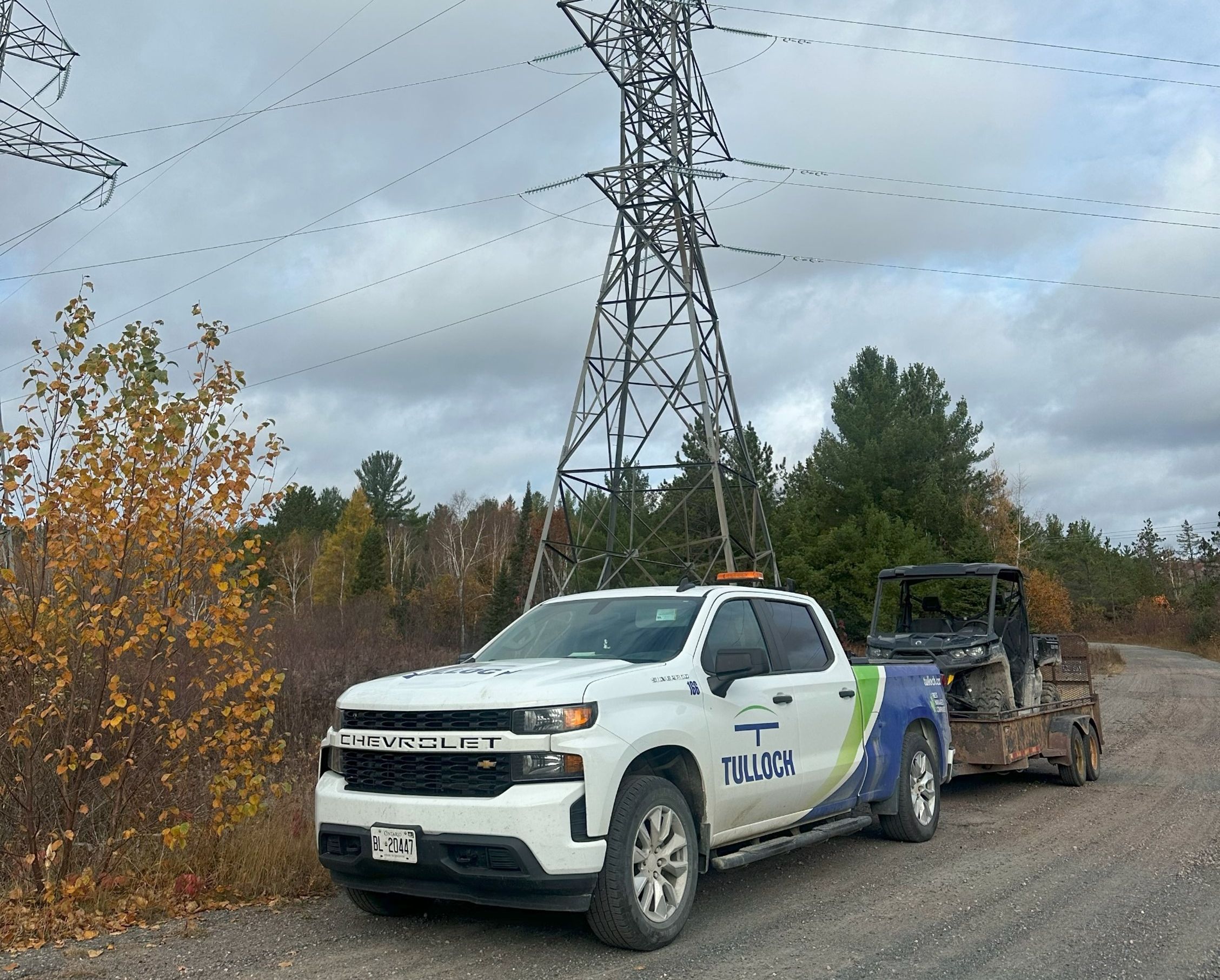 TULLOCH company truck beside transmission infrastructure on the Northeast Powerline project.