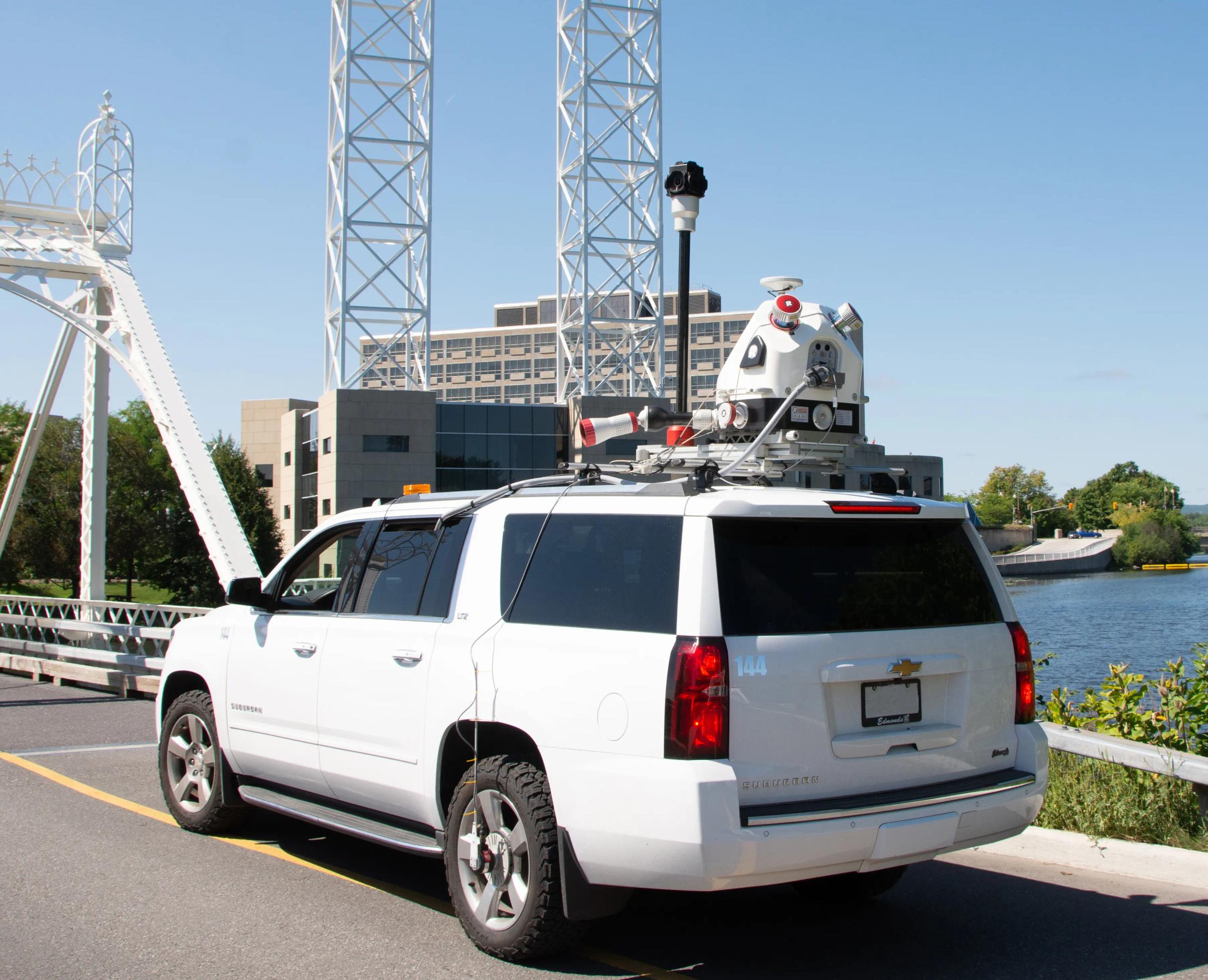 Mobile LiDAR survey vehicle collecting transportation corridor data.
