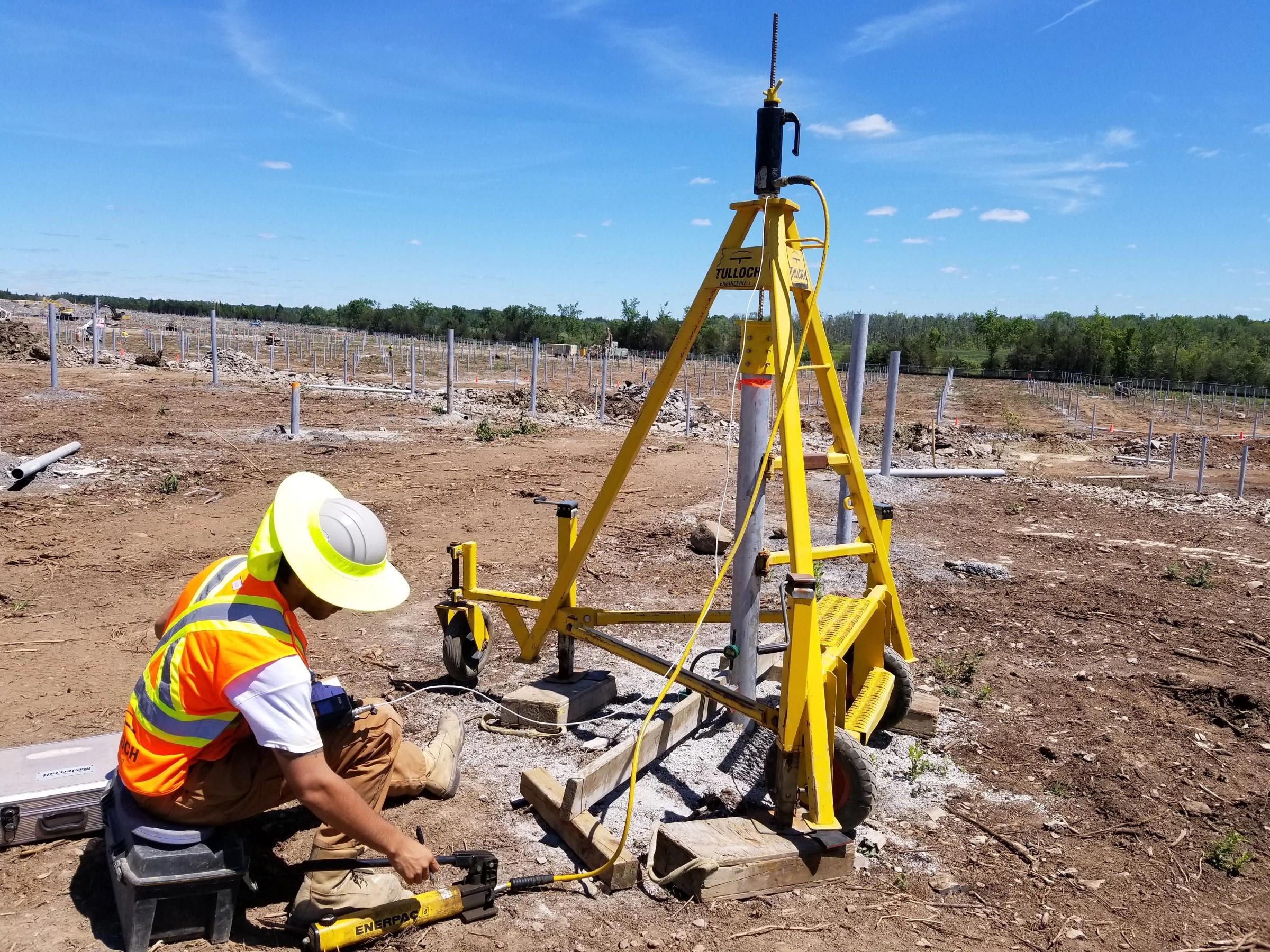 TULLOCH field technician establishing survey control at a solar energy project in 2018.