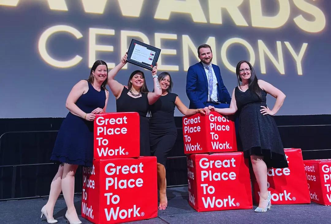 Accepting award for TULLOCH being named one of the Best Workplaces in Canada.