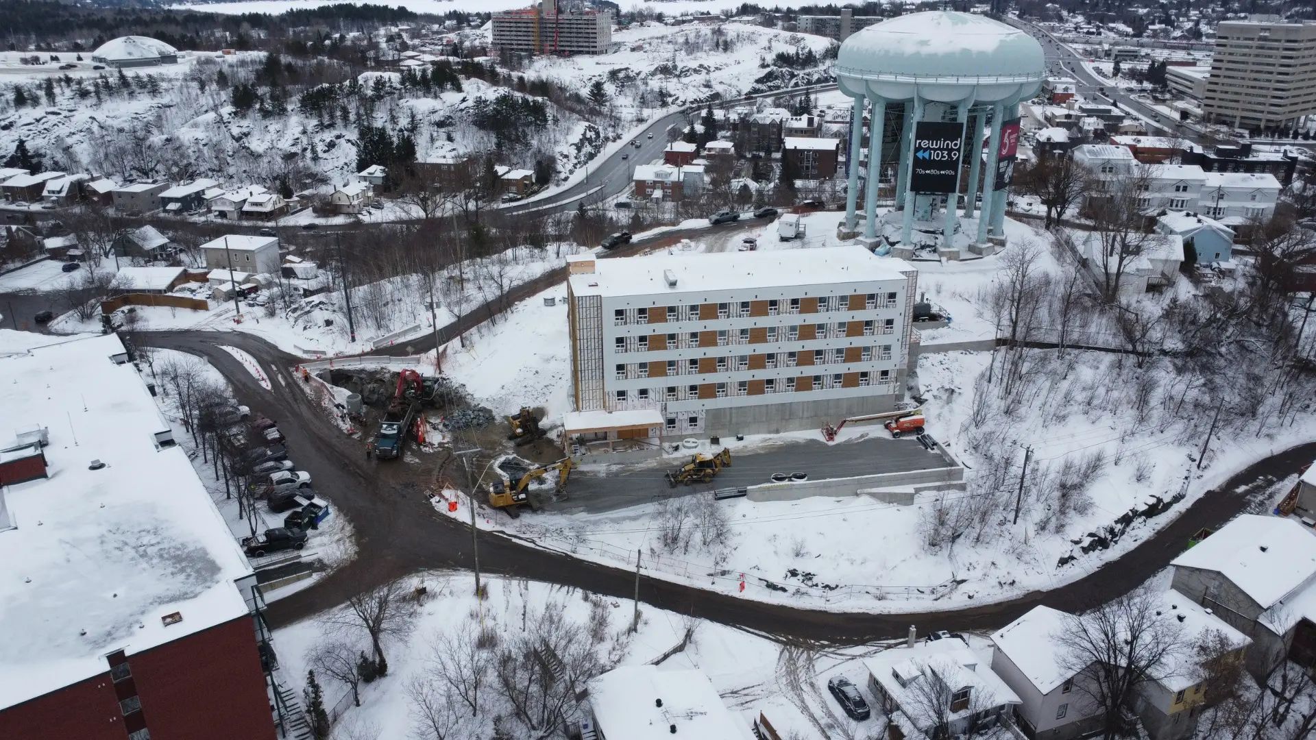 Winter aerial view of the Peace Tower site and surrounding buildings.