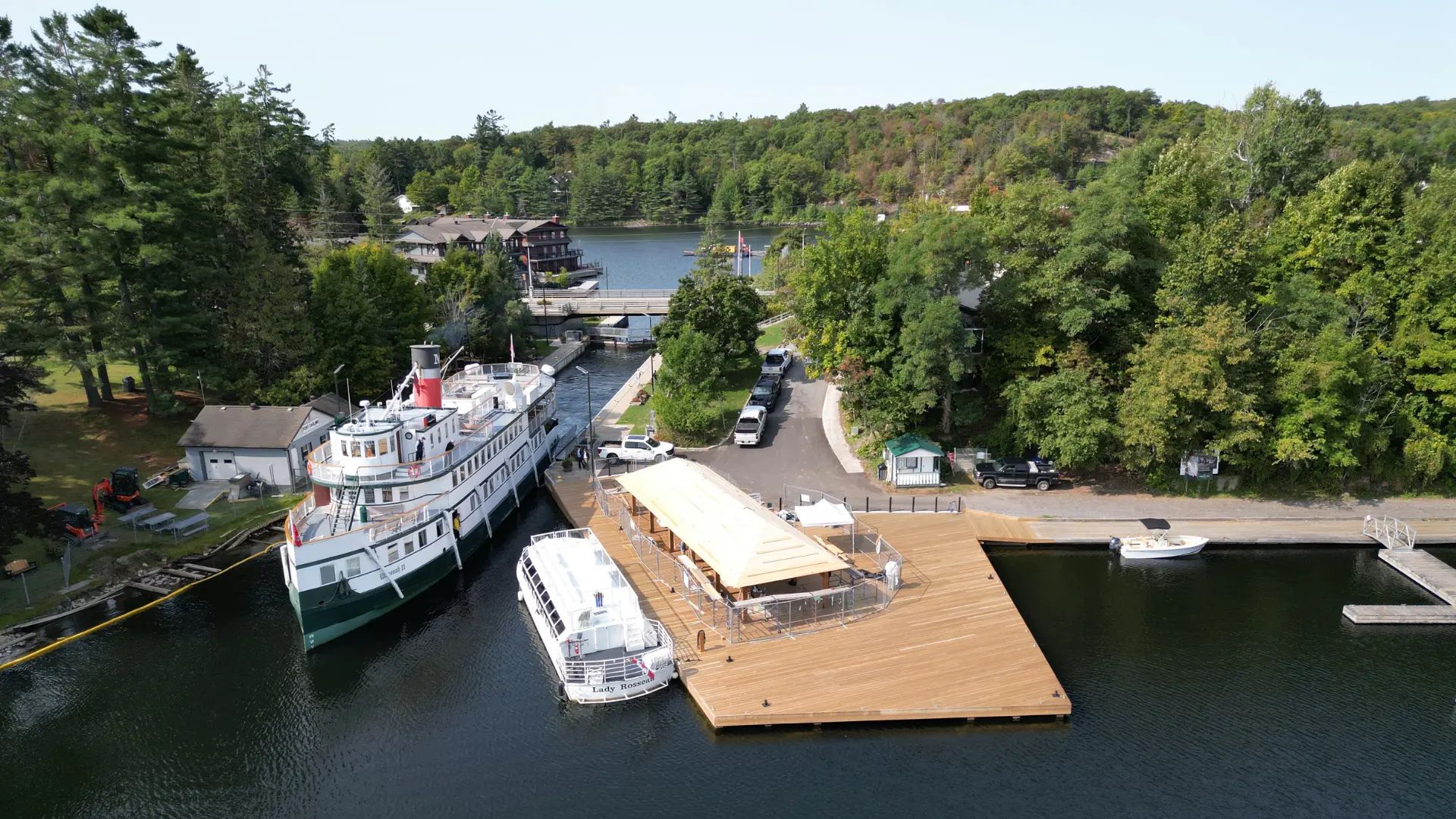 Aerial view of the Port Carling dock, pavilion, marina, and waterfront.