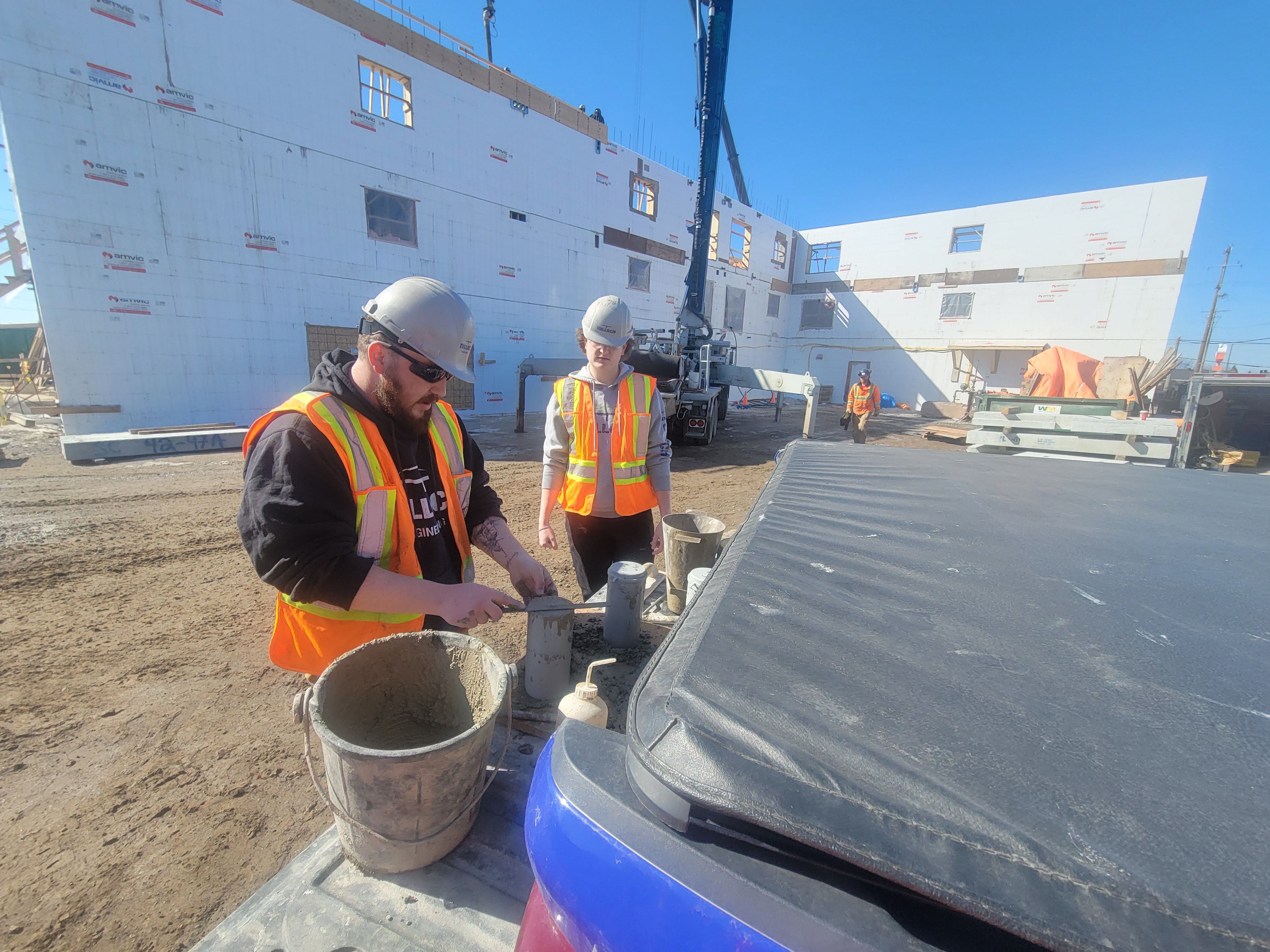 TULLOCH field staff reviewing construction work at the Sault Legion project.