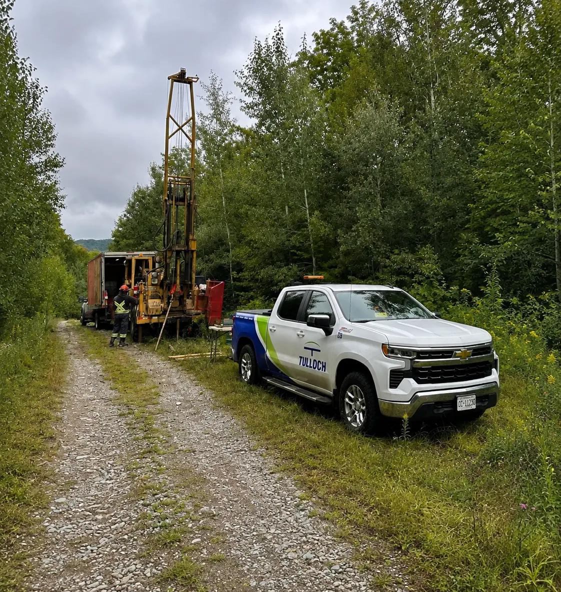 Geotechnical drill rig and TULLOCH vehicle along the North Shore Link transmission corridor.