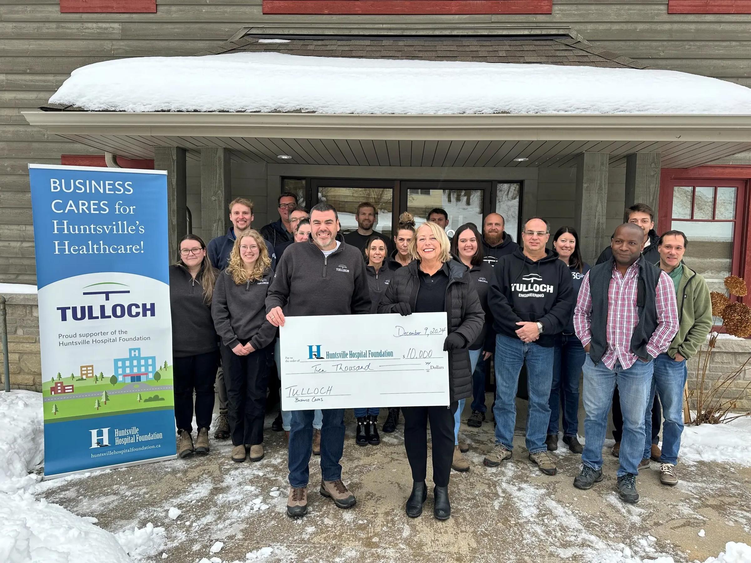 Huntsville TULLOCH team presenting cheque to Huntsville Hospital Foundation.