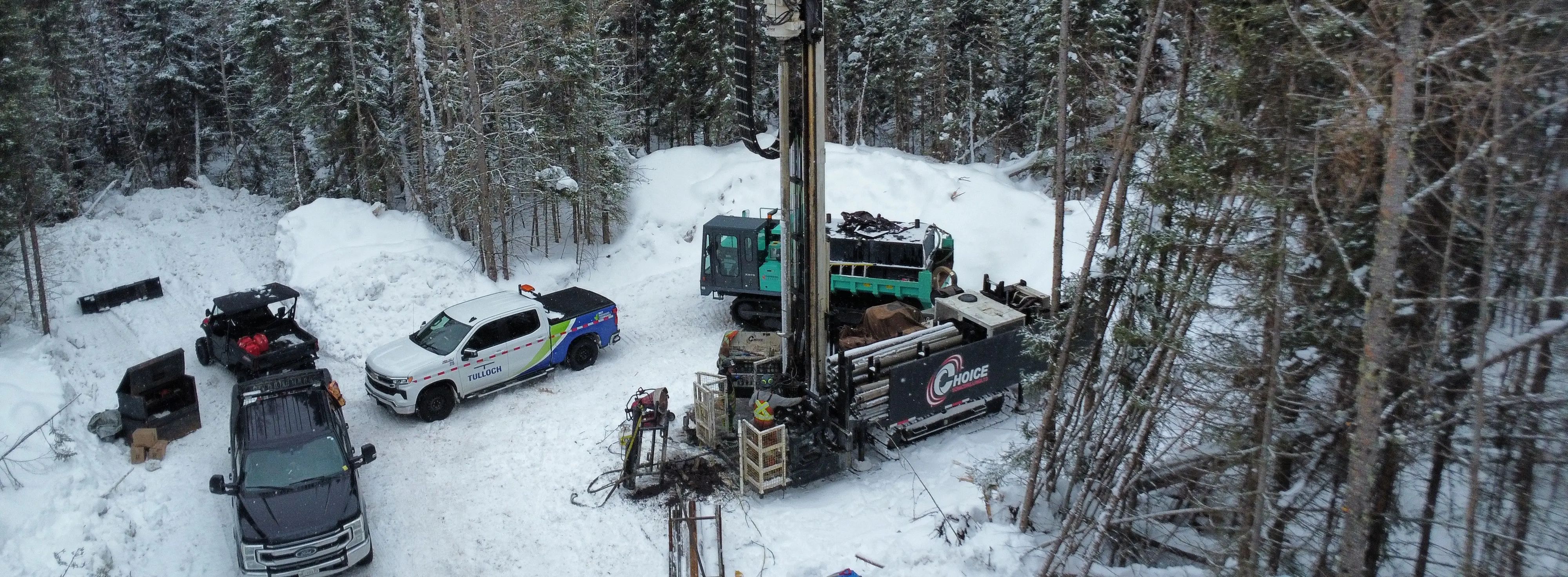 Geotechnical drilling setup in a remote wooded area at the Crawford Project near Timmins.