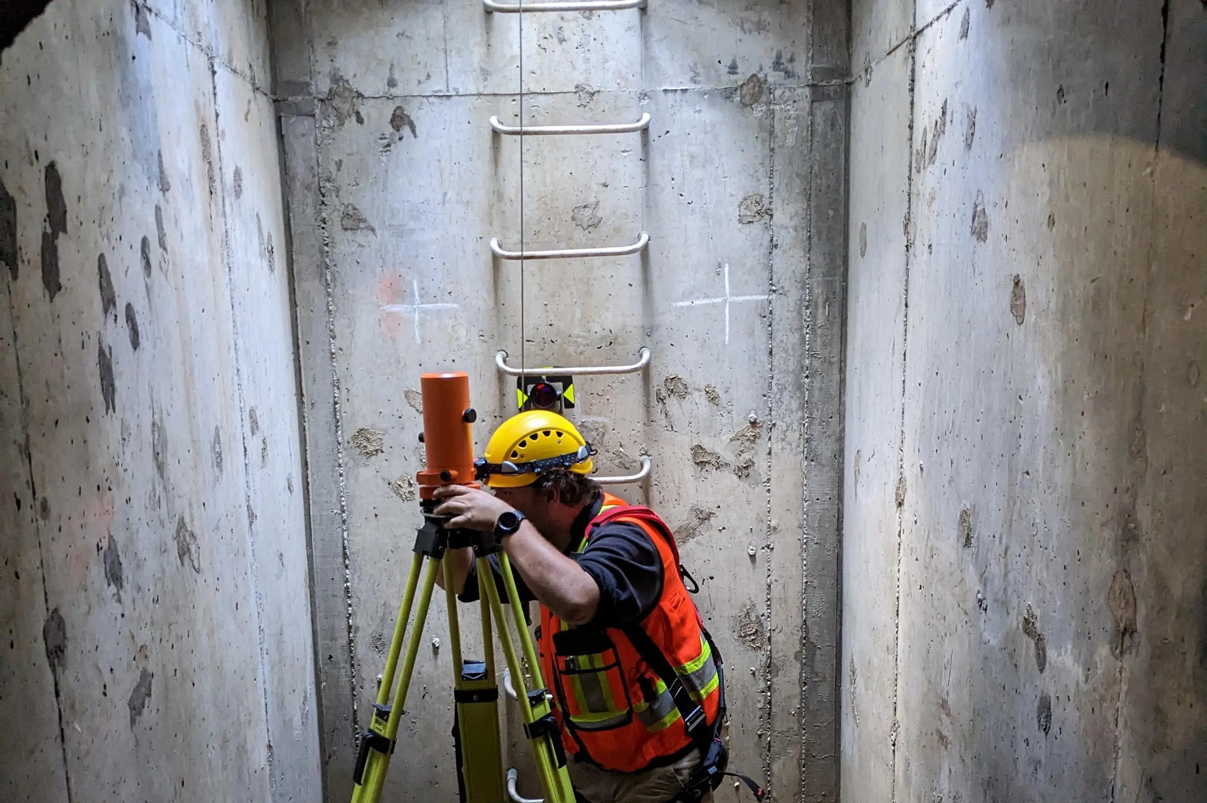 TULLOCH technician setting control in shaft.