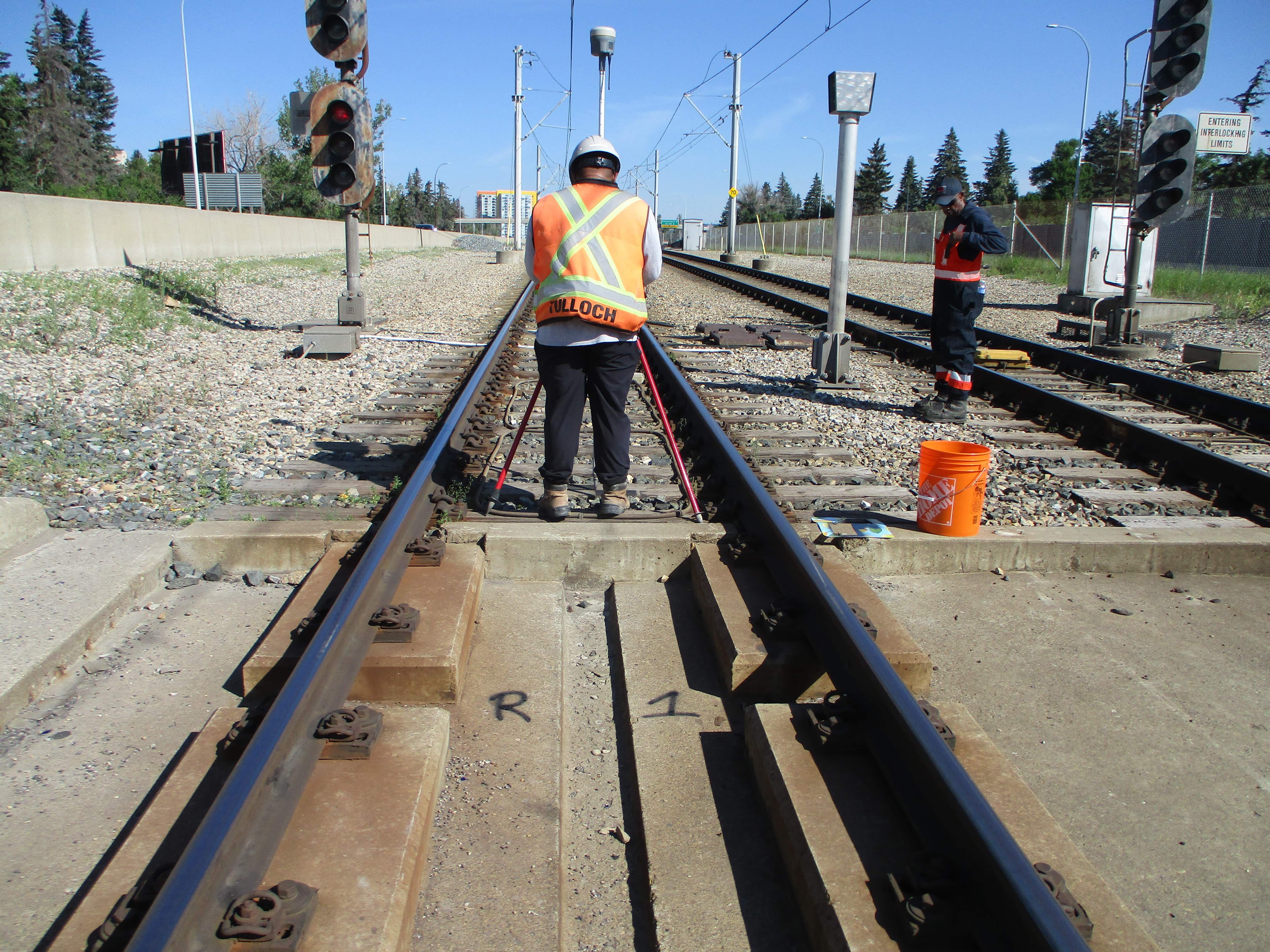 TULLOCH surveyor collecting track measurements on a rail corridor in Alberta.