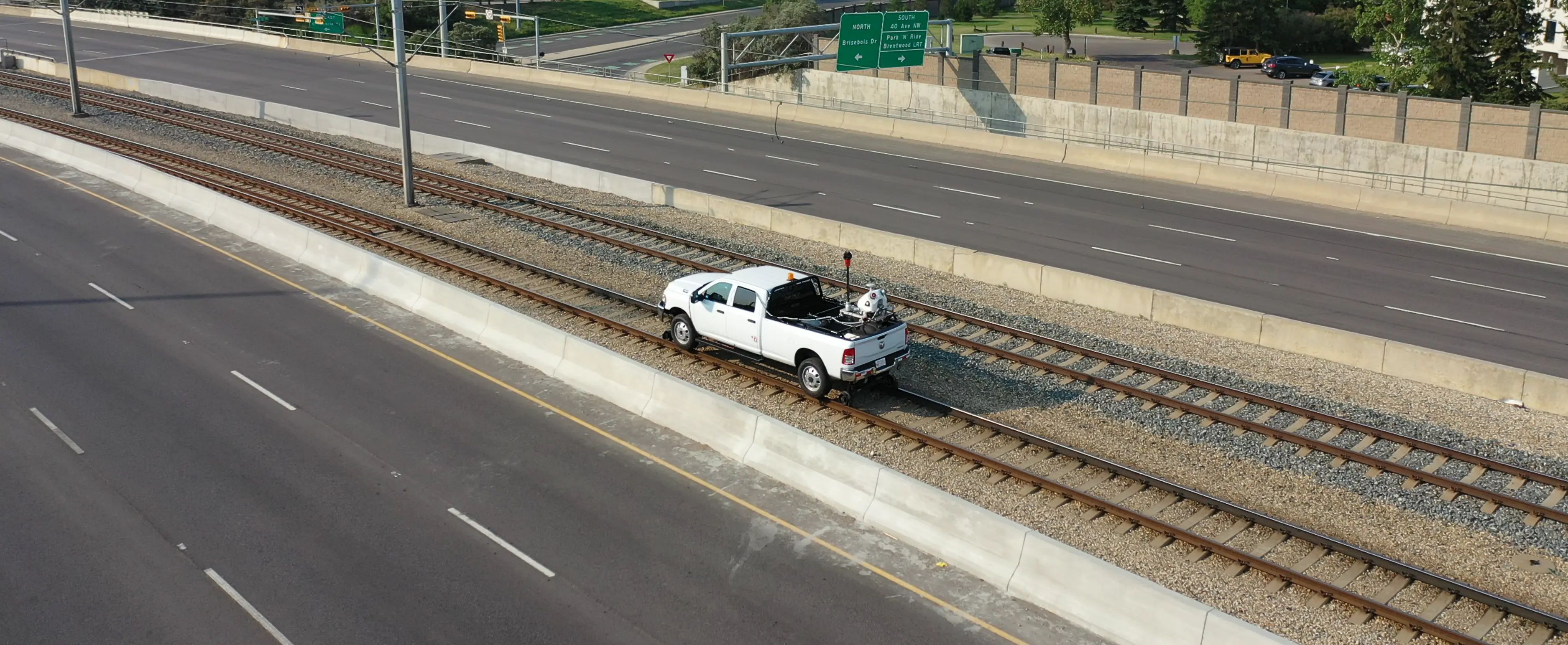 TULLOCH mobile mapping truck collecting data along a rail corridor.