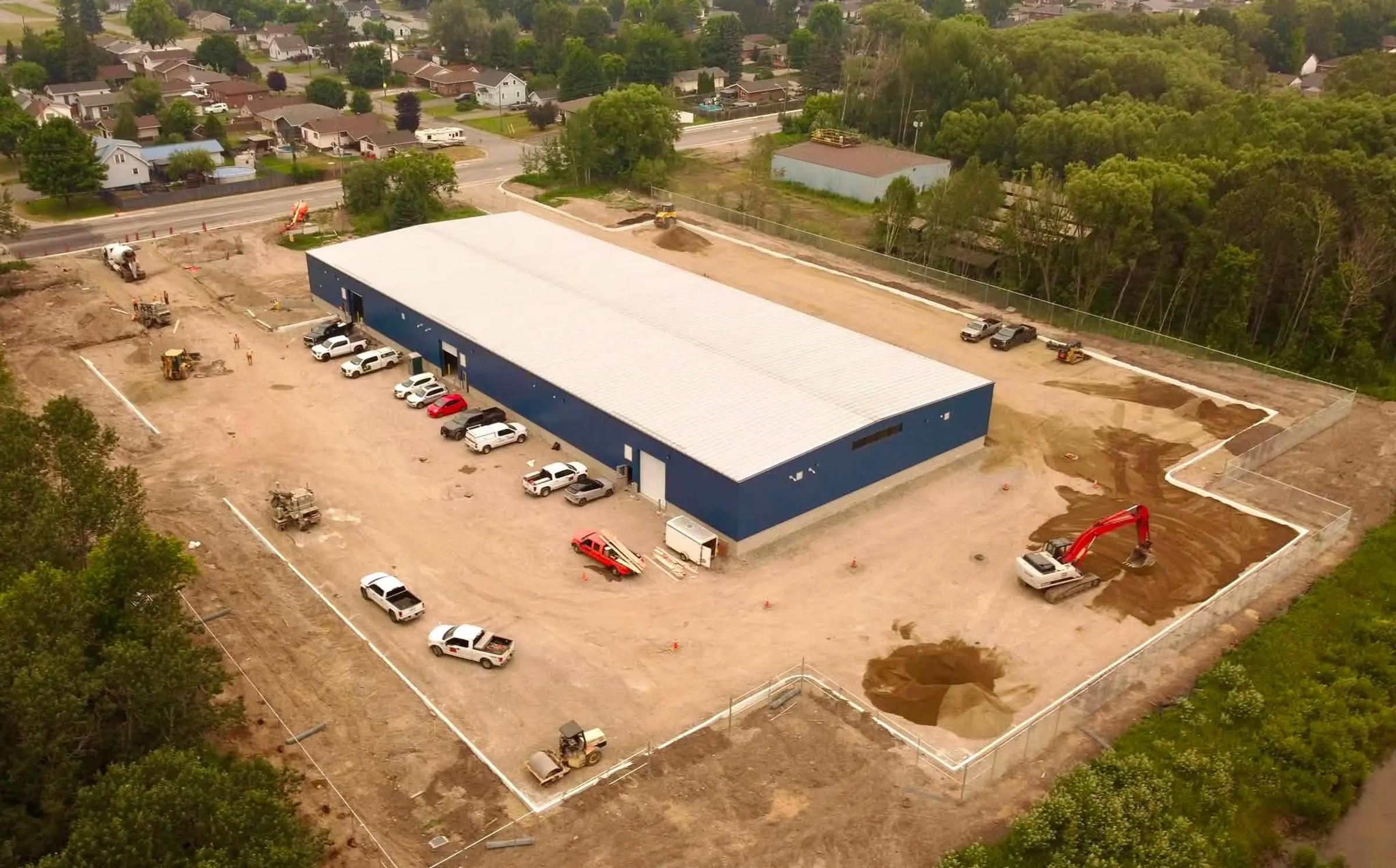 Aerial view of the GL Fish facility and surrounding construction site.