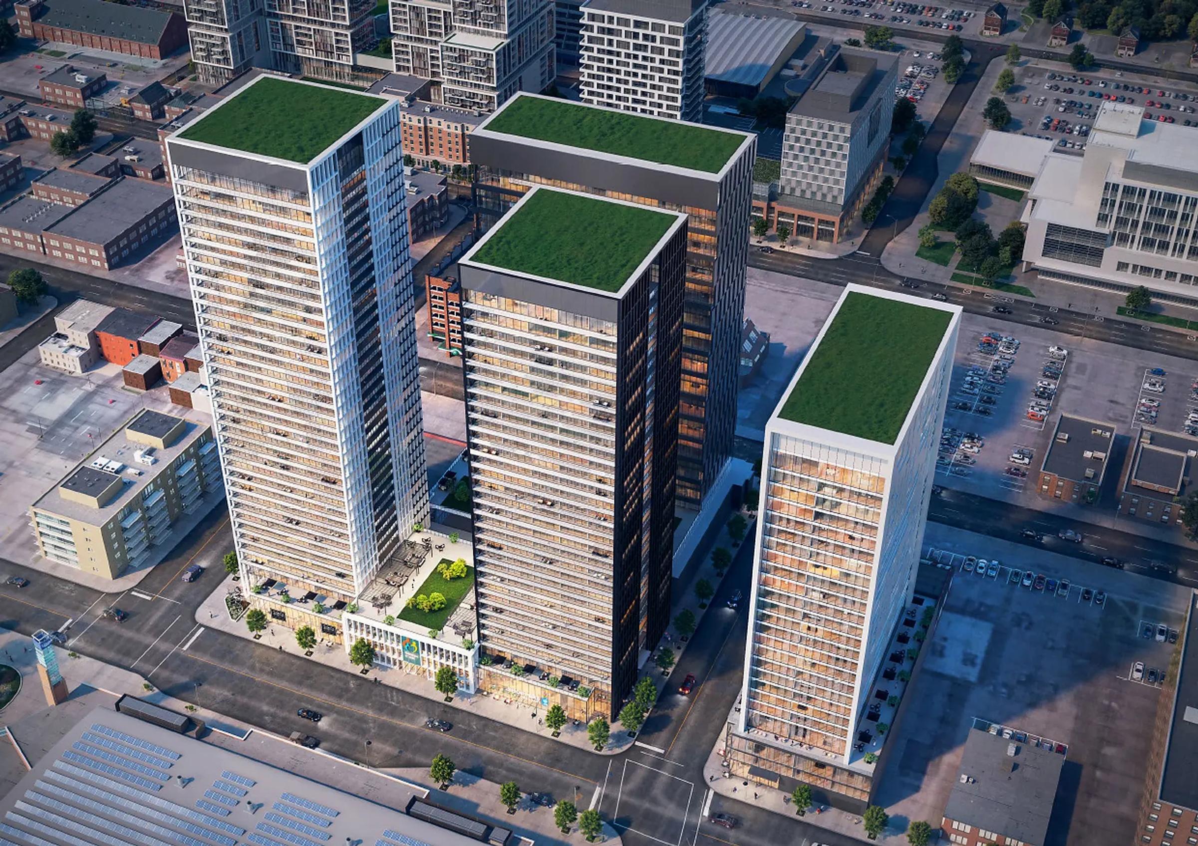 Aerial rendering showing the three residential towers and podium at Centra Site A in downtown Oshawa.