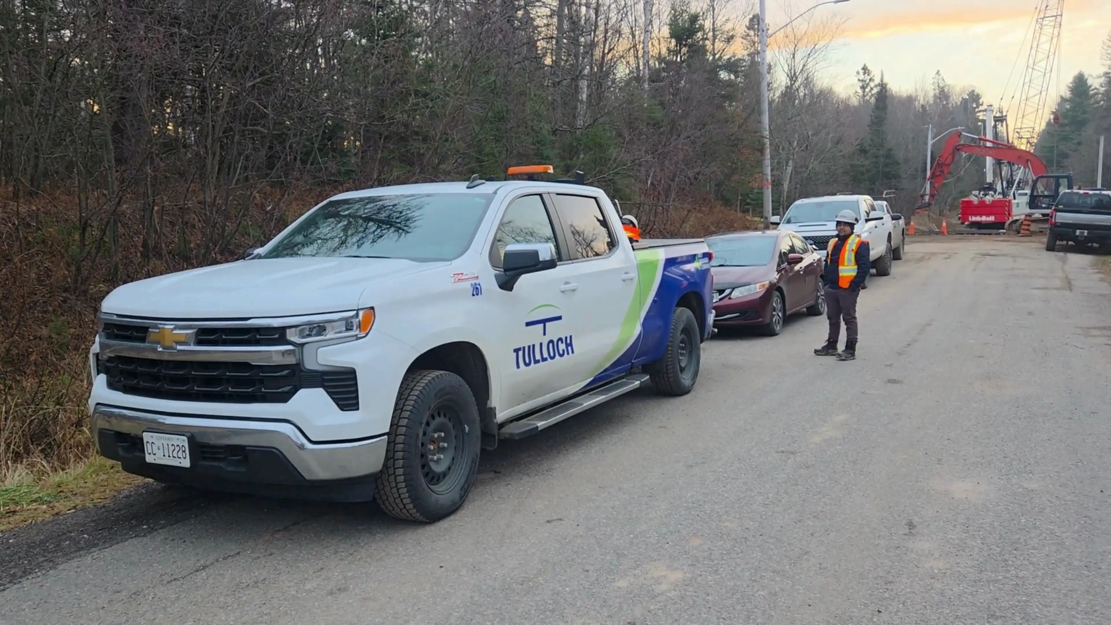 TULLOCH company truck and field crew at the Gagnon Road project.