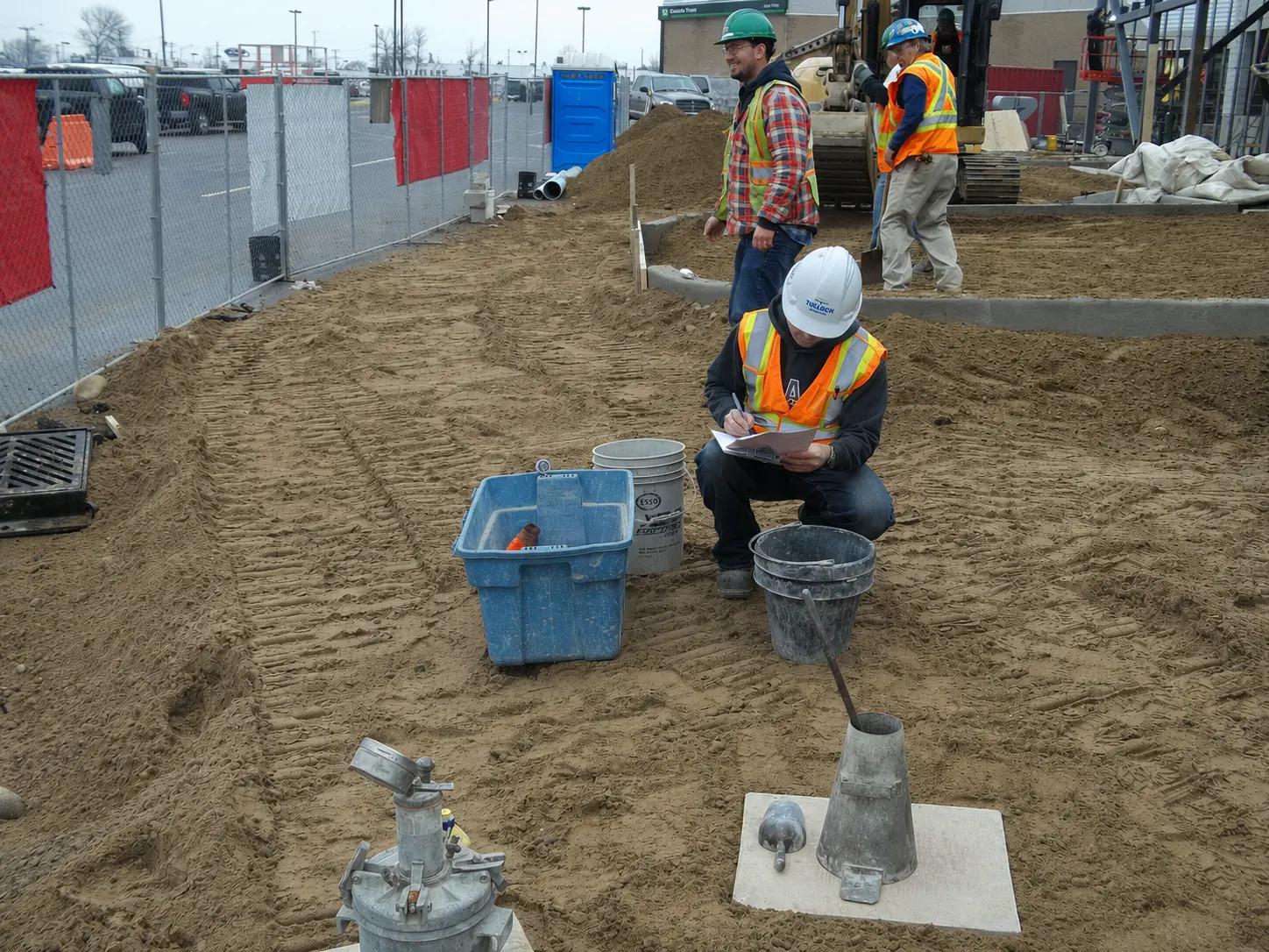 TULLOCH field technician completing construction layout or verification work.