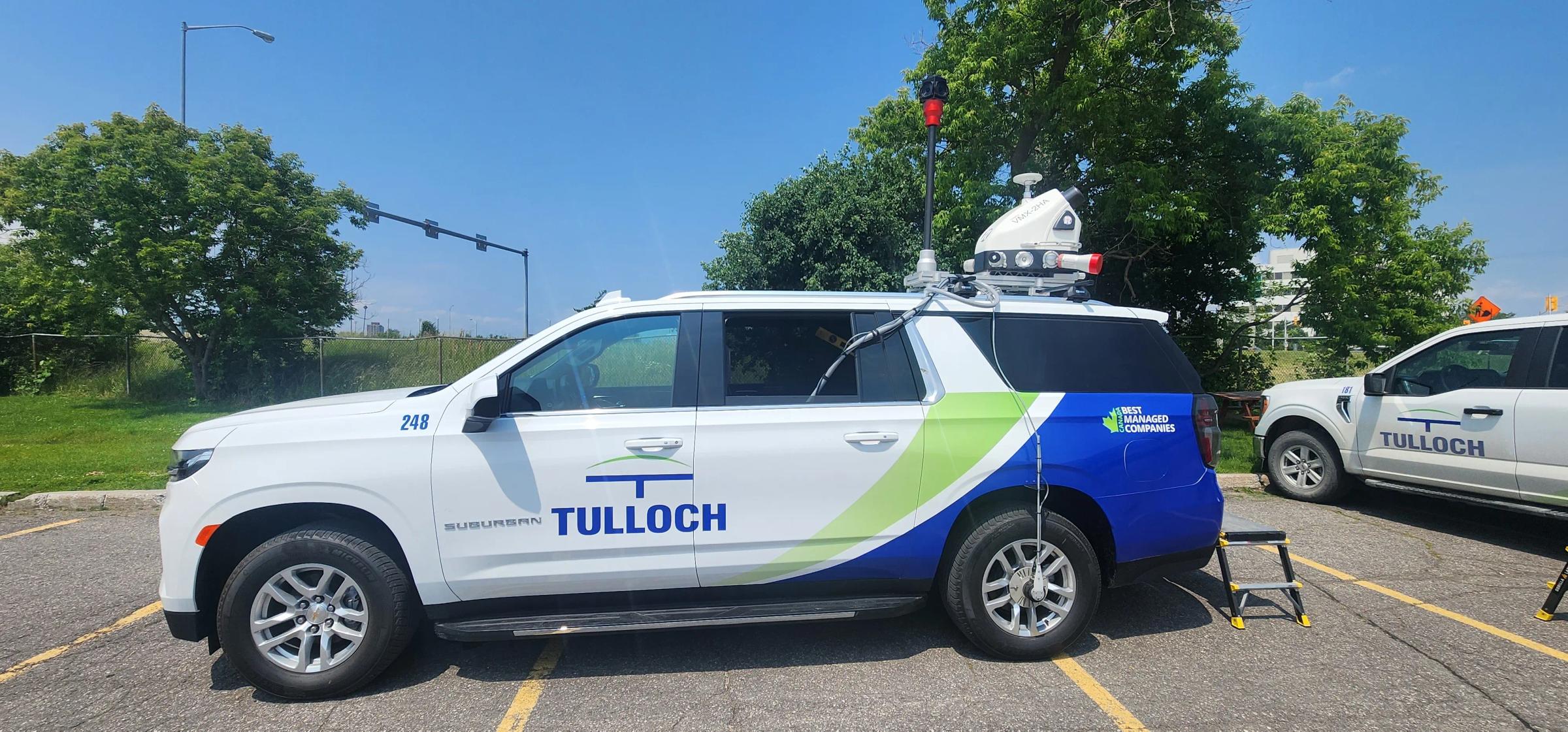 TULLOCH vehicle equipped with a roof-mounted mobile LiDAR scanning system.
