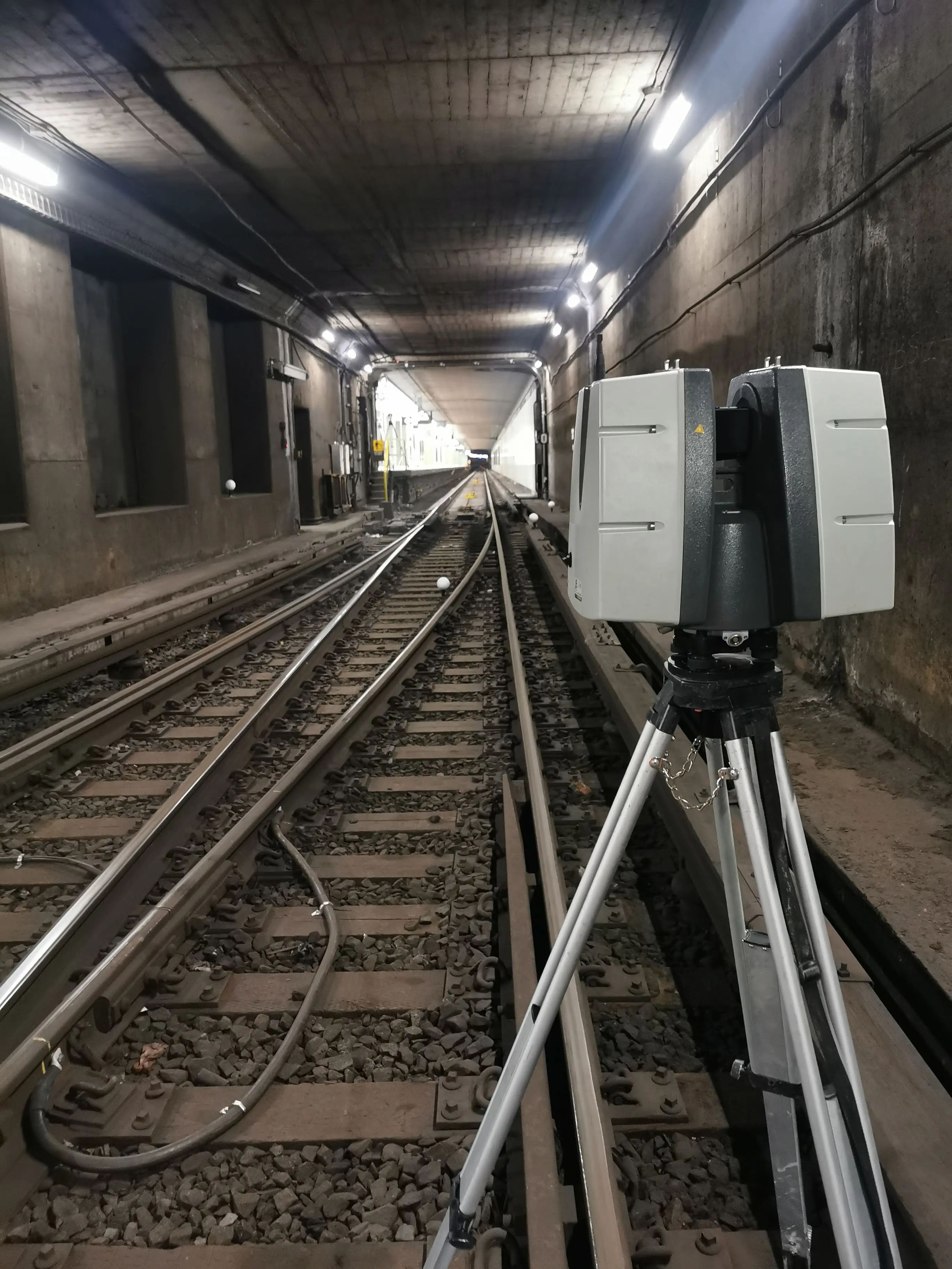 LiDAR scanner set up inside a rail tunnel.