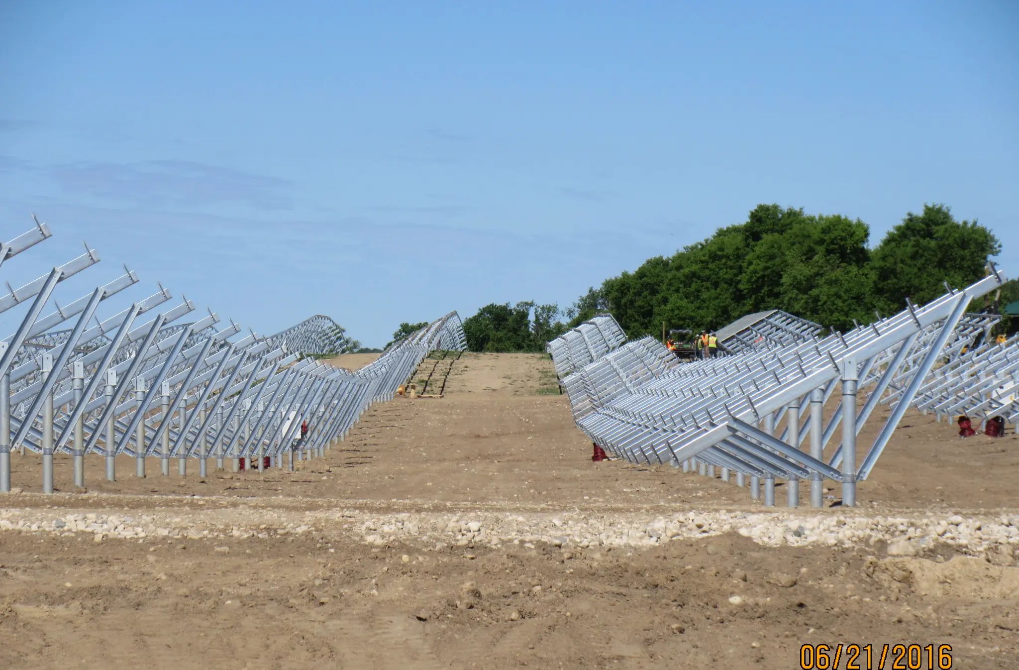 Solar racking foundations under construction at a utility-scale solar site.