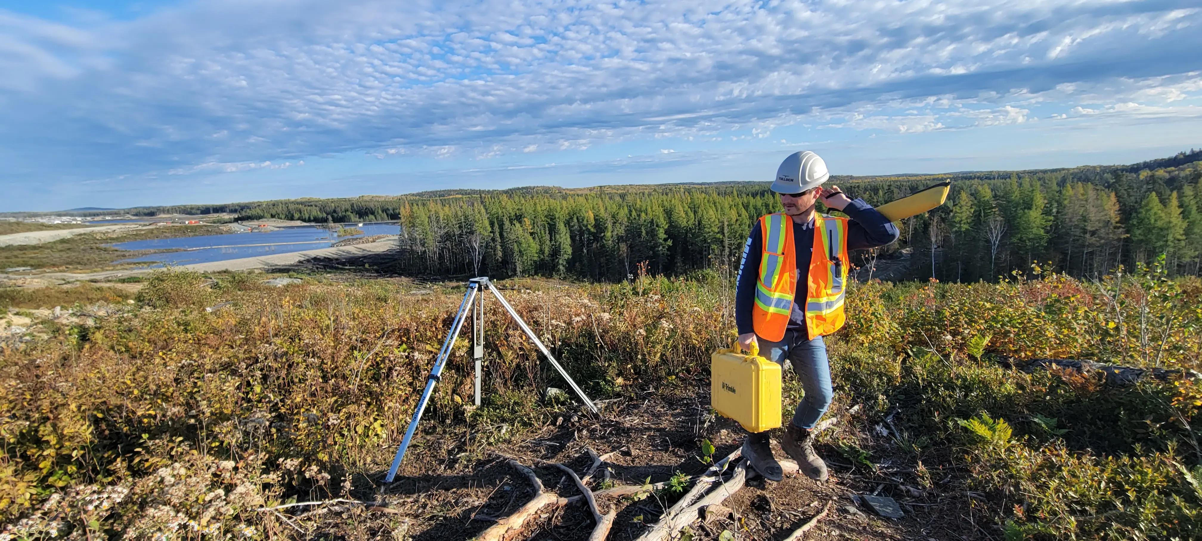 TULLOCH field technician completing survey work in a remote landscape.