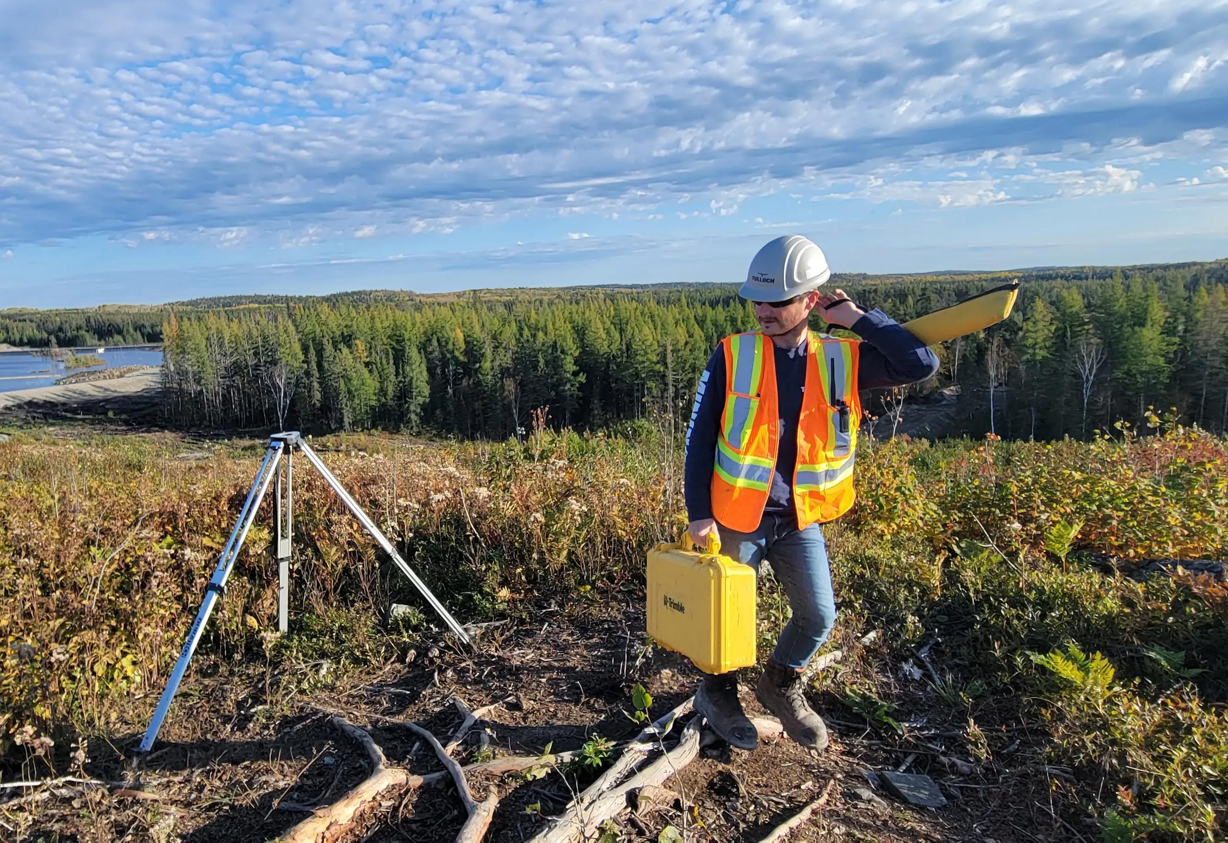 TULLOCH field technician completing survey work in a remote landscape.