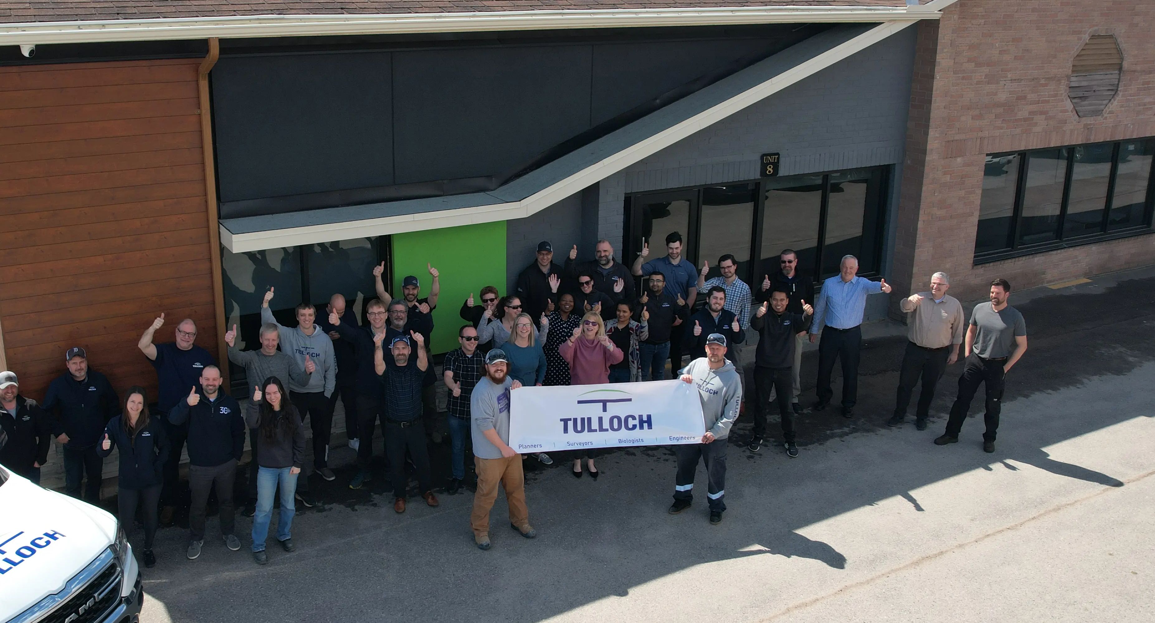 TULLOCH team gathered outside the Sault Ste. Marie office.