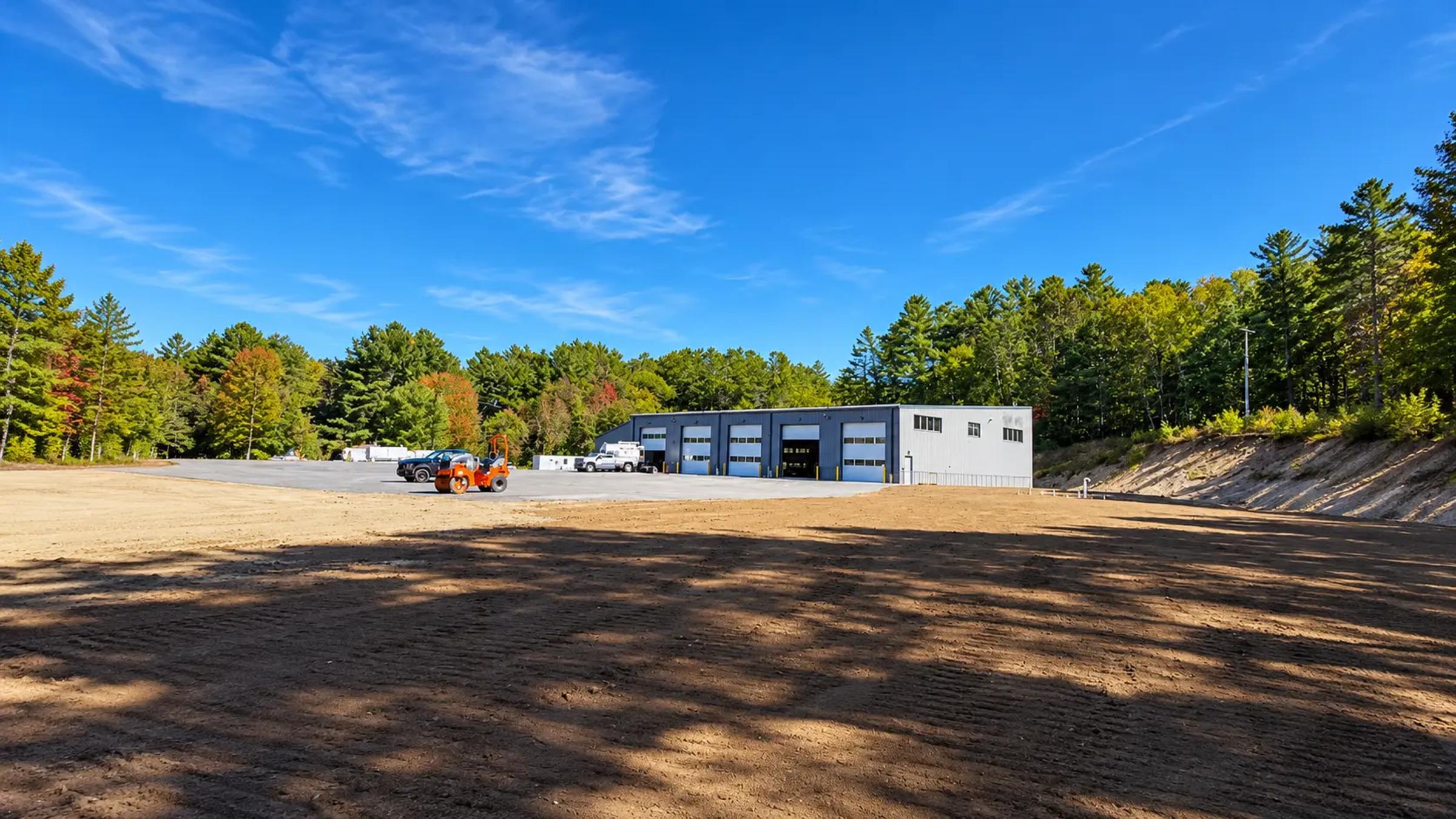 Wide angle of outside Algonquin Highlands Public Works Garage.