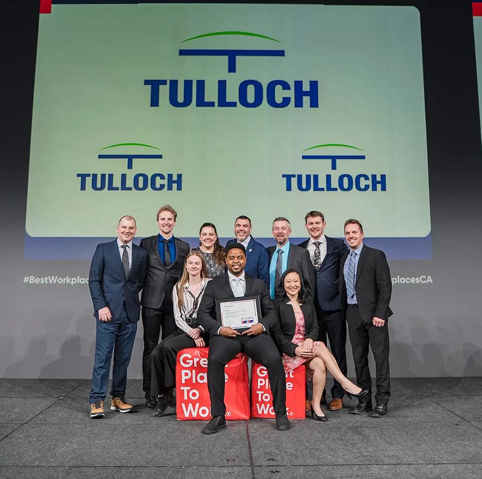 Team TULLOCH accepting award.