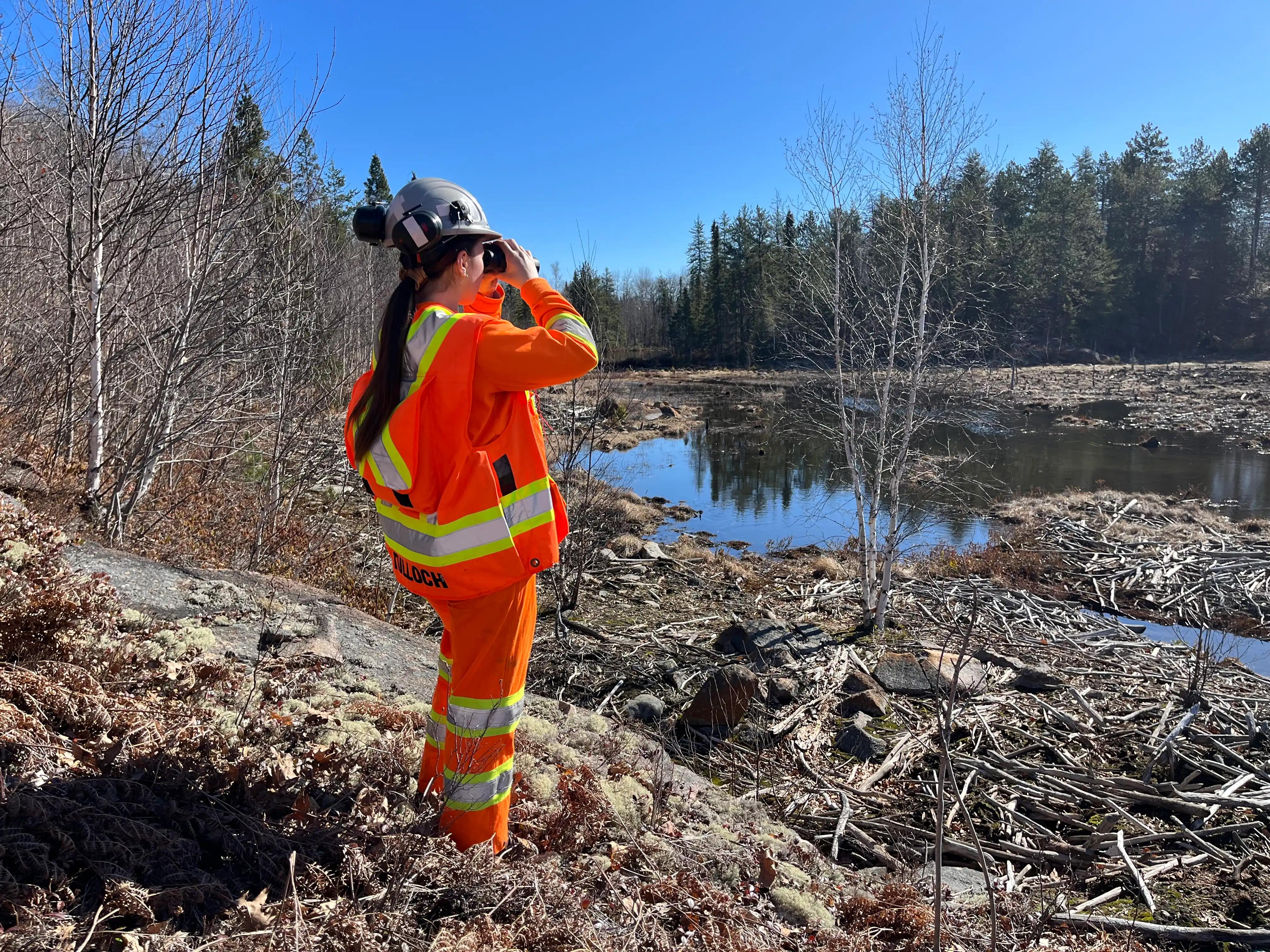 TULLOCH environmental field technician completing site work for a deep geological repository study.