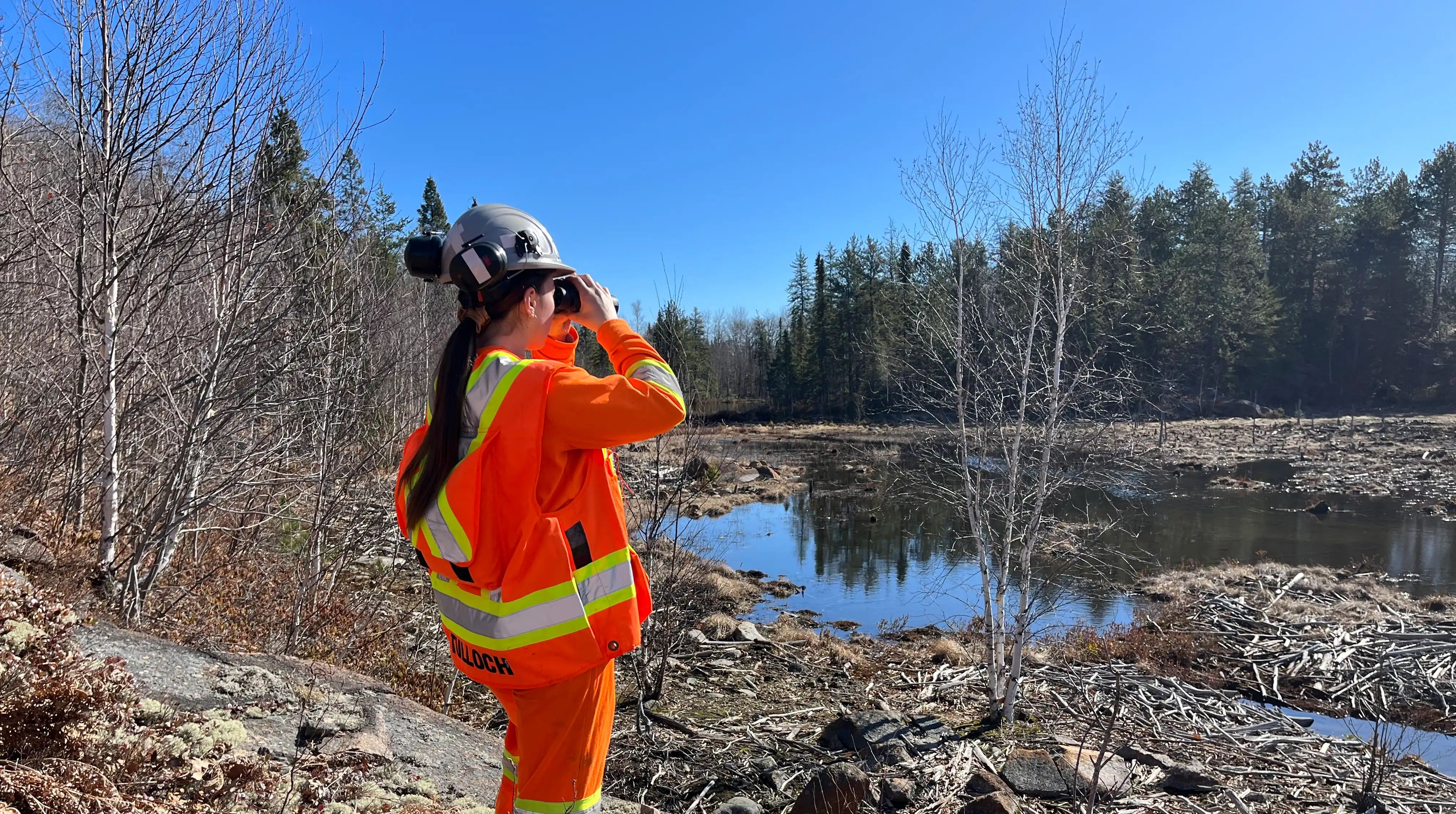 TULLOCH environmental field technician completing site work for a deep geological repository study.