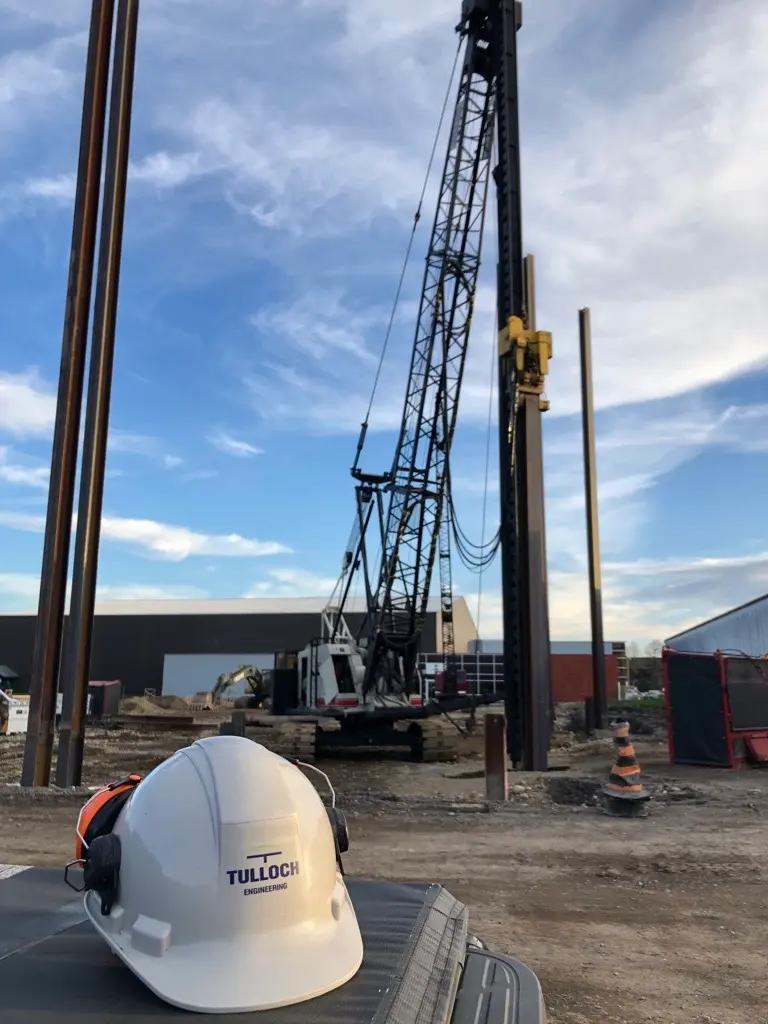 Geotechnical drilling equipment operating at an active project site.