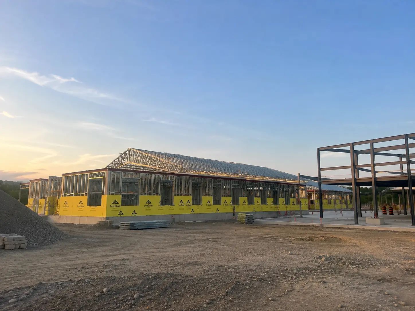 St. Joseph's building under construction with structural steel framing.
