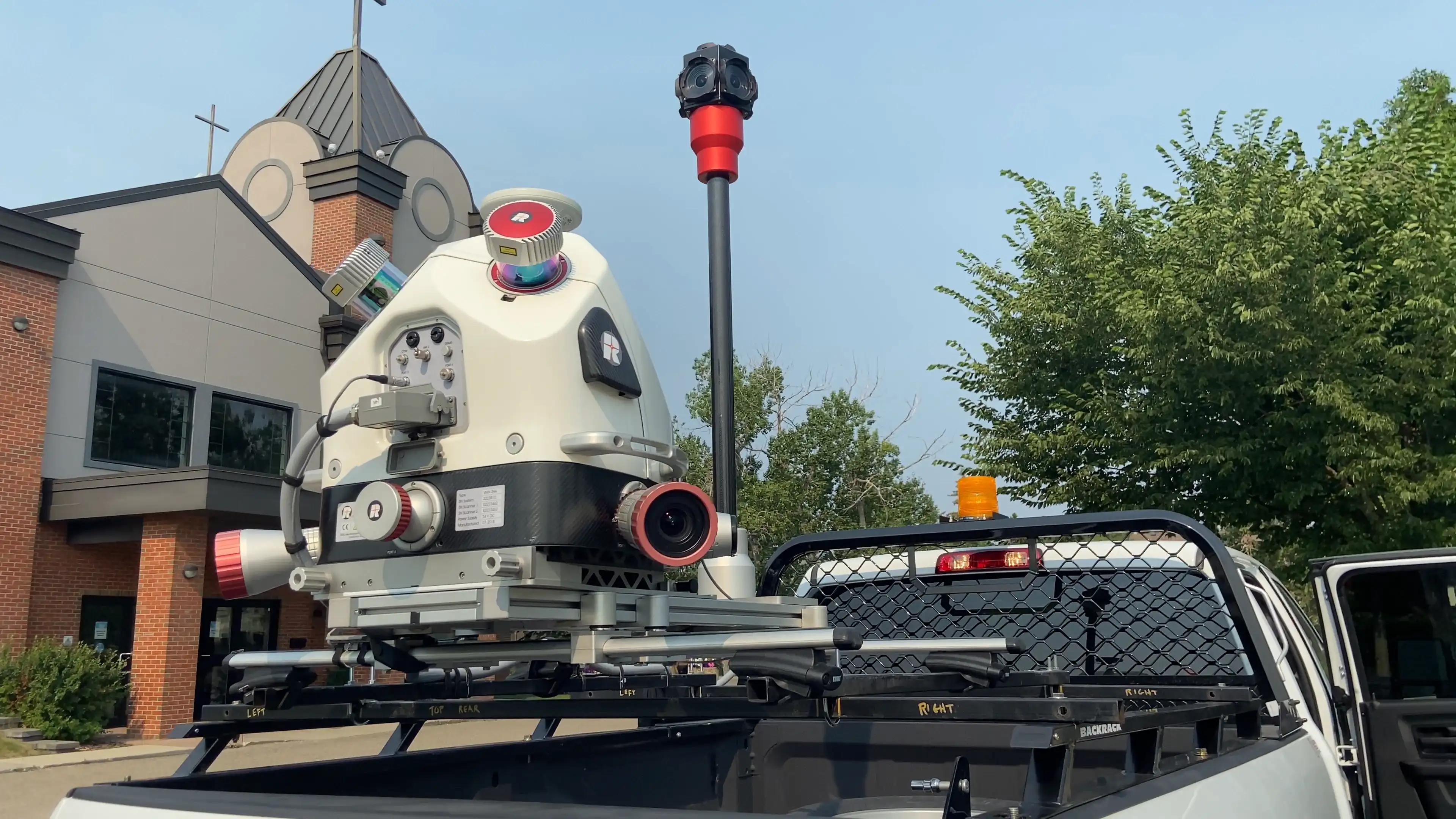 Mobile LiDAR scanner mounted on a TULLOCH mapping vehicle.